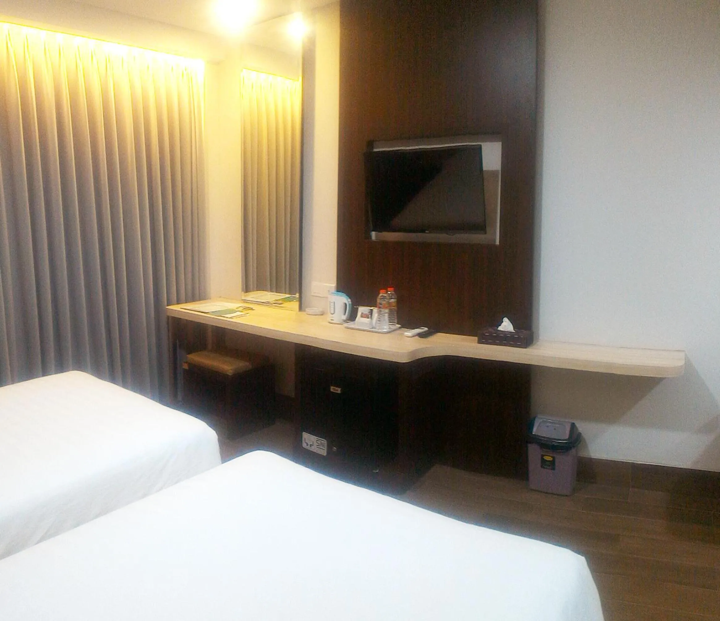 Bed in Harmoni Hotel Garut