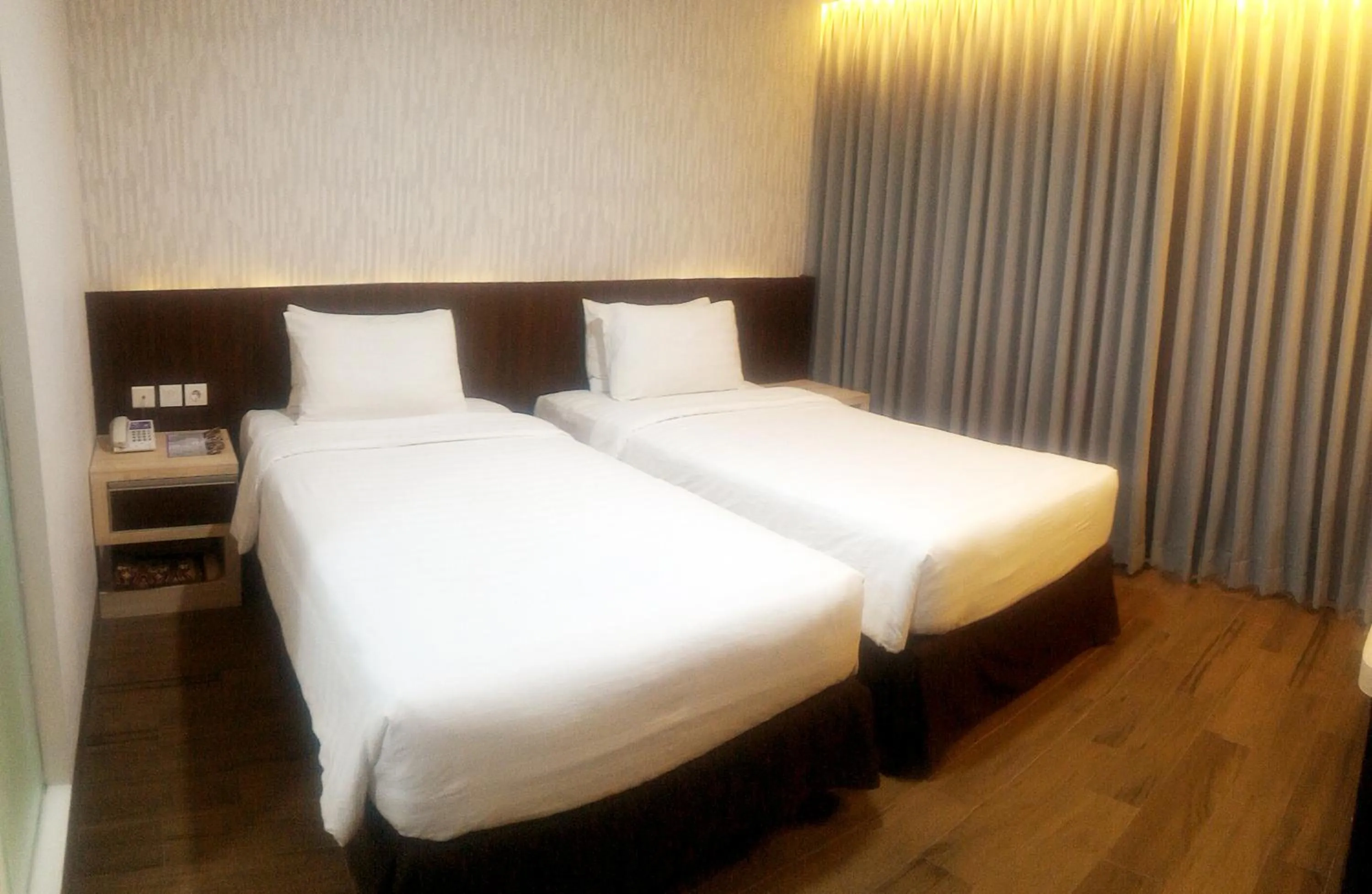 Bed in Harmoni Hotel Garut