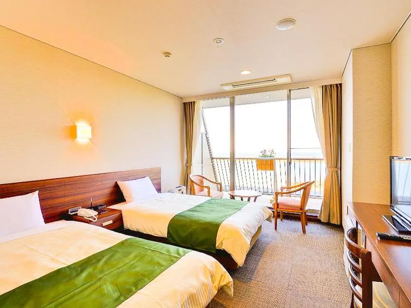 Photo of the whole room, Bed in Hotel Seaside Shimabara