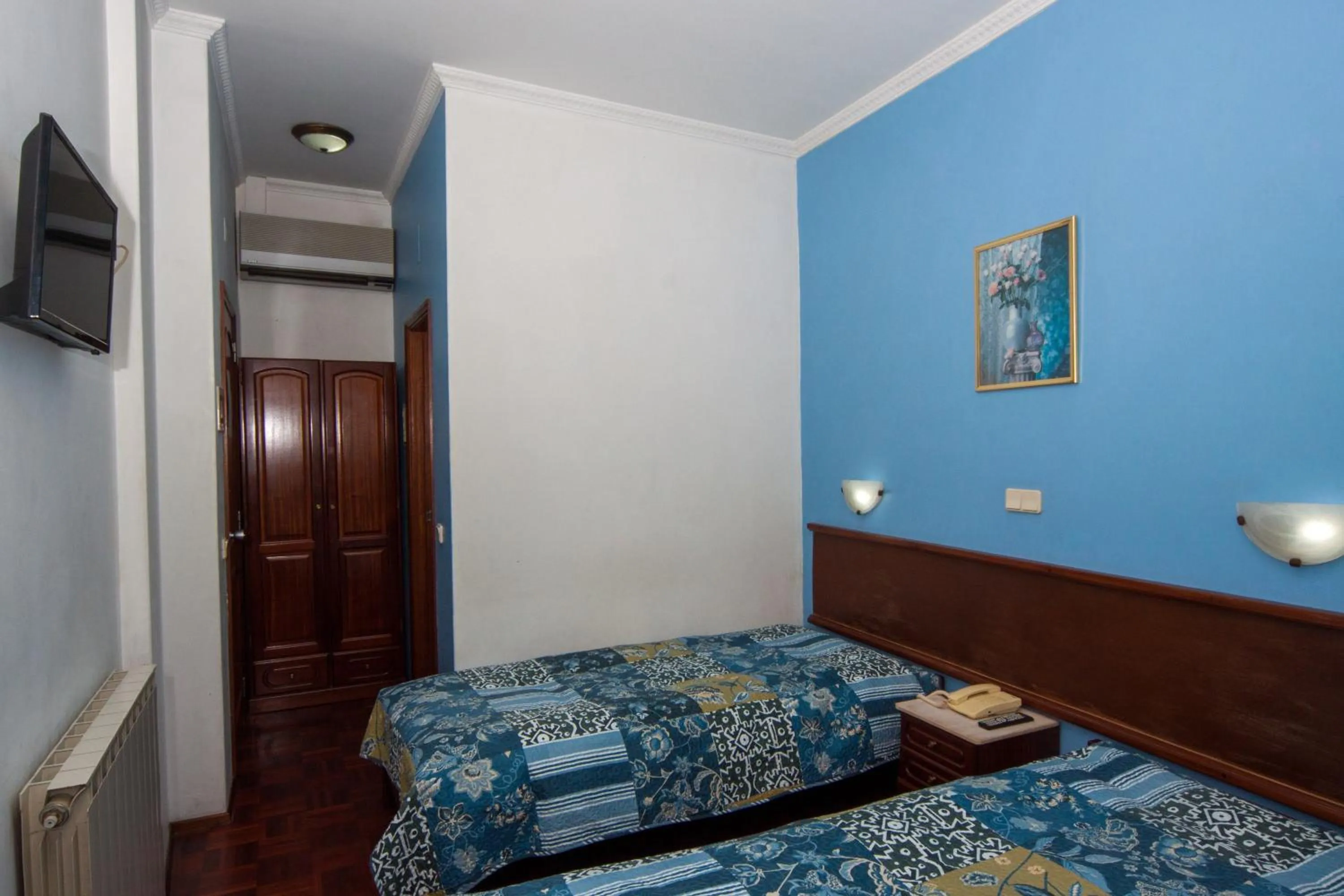 Bed in Hotel Leiriense