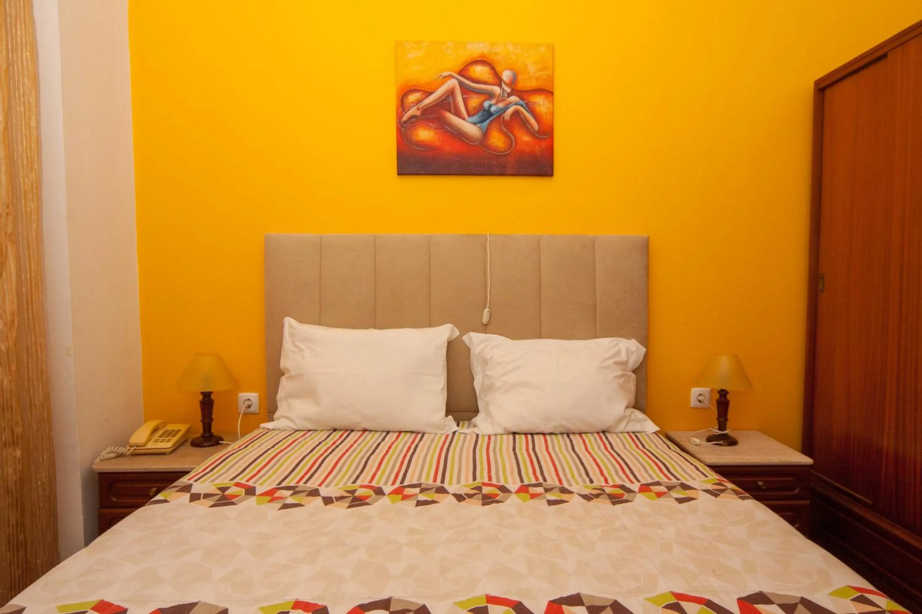 Bed in Hotel Leiriense