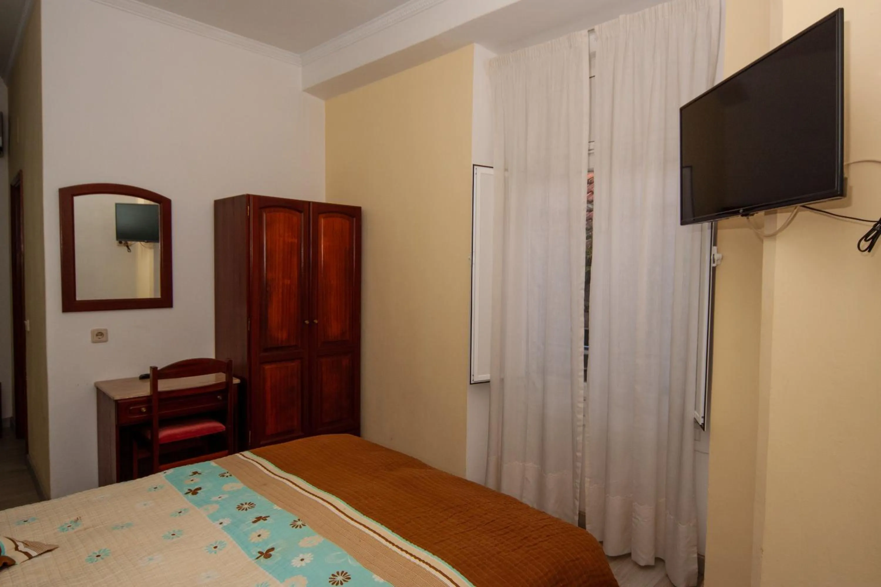 Bed in Hotel Leiriense