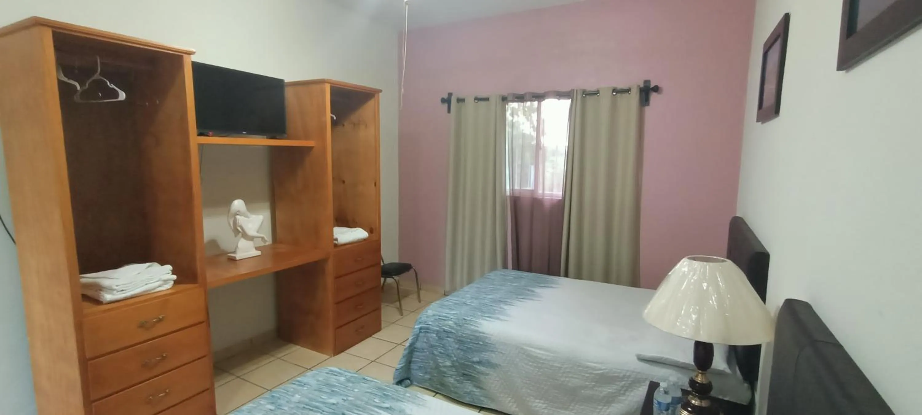 TV and multimedia, Bed in Hotel La Estancia