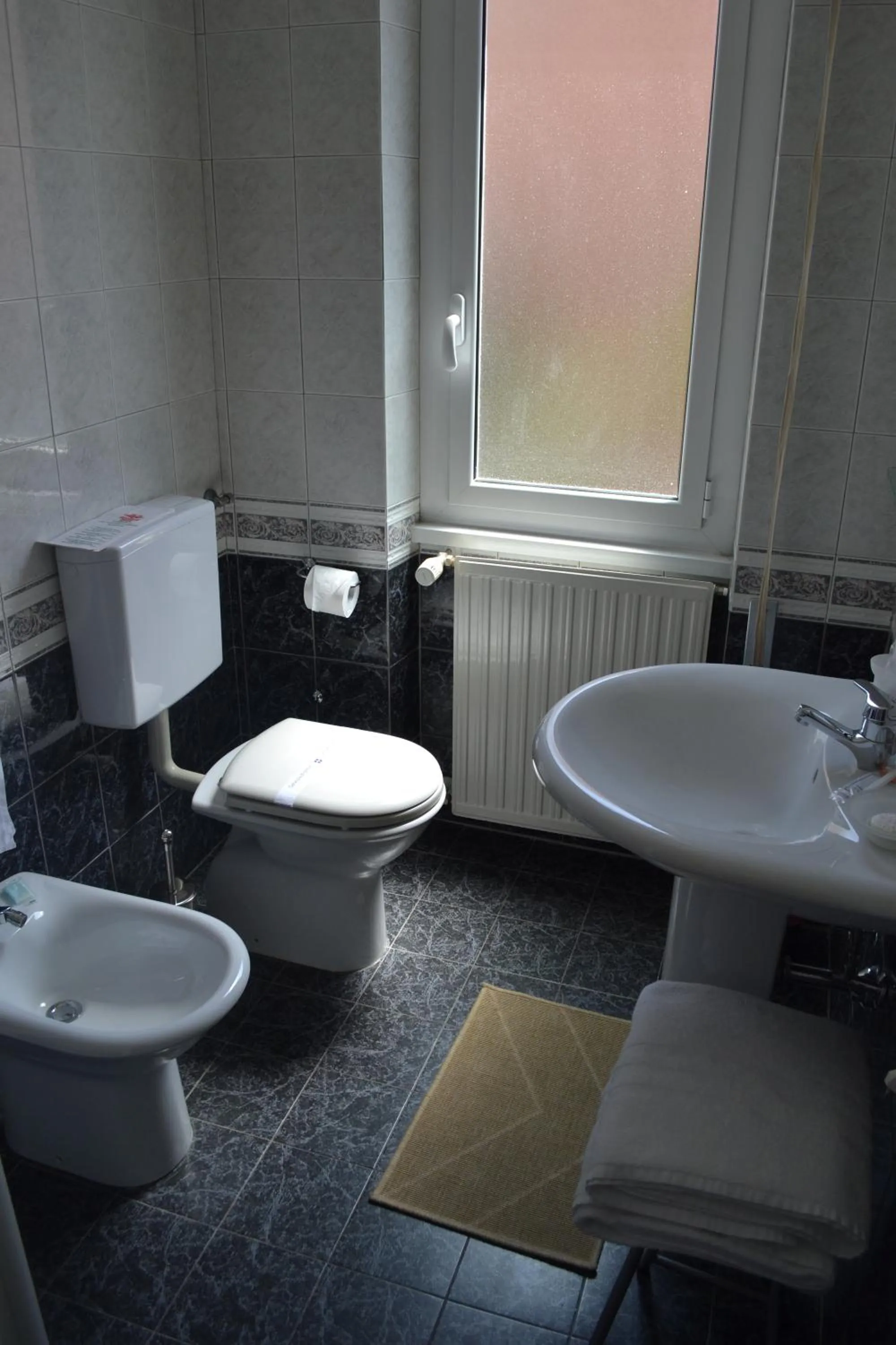 Bathroom in Hotel Il Gatto