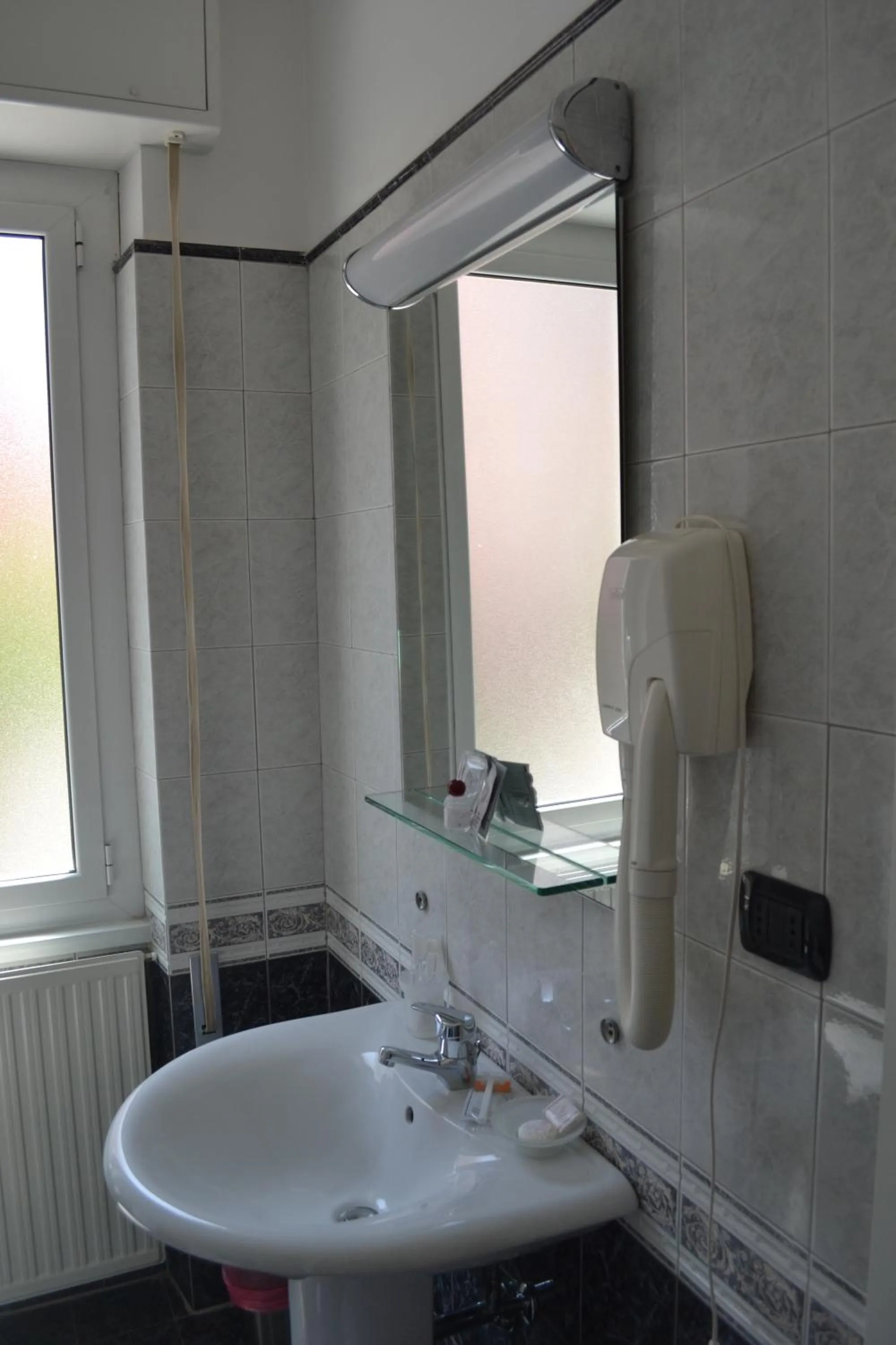 Bathroom in Hotel Il Gatto