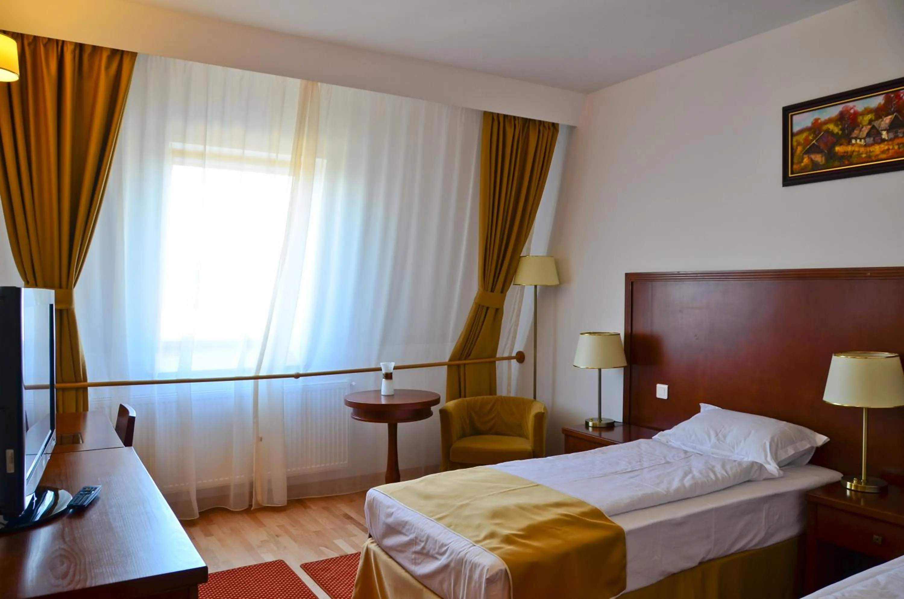 Bed in Hotel Miraj