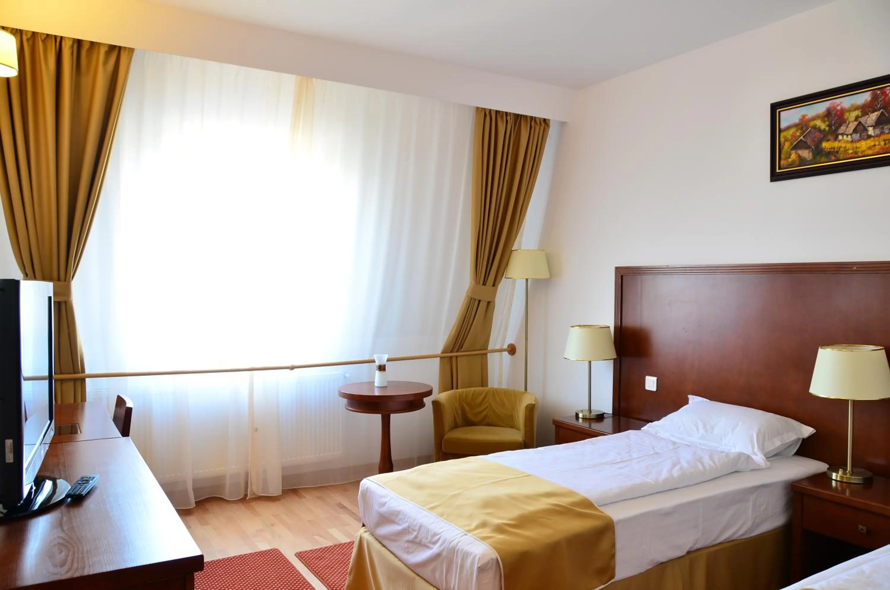 Bed in Hotel Miraj