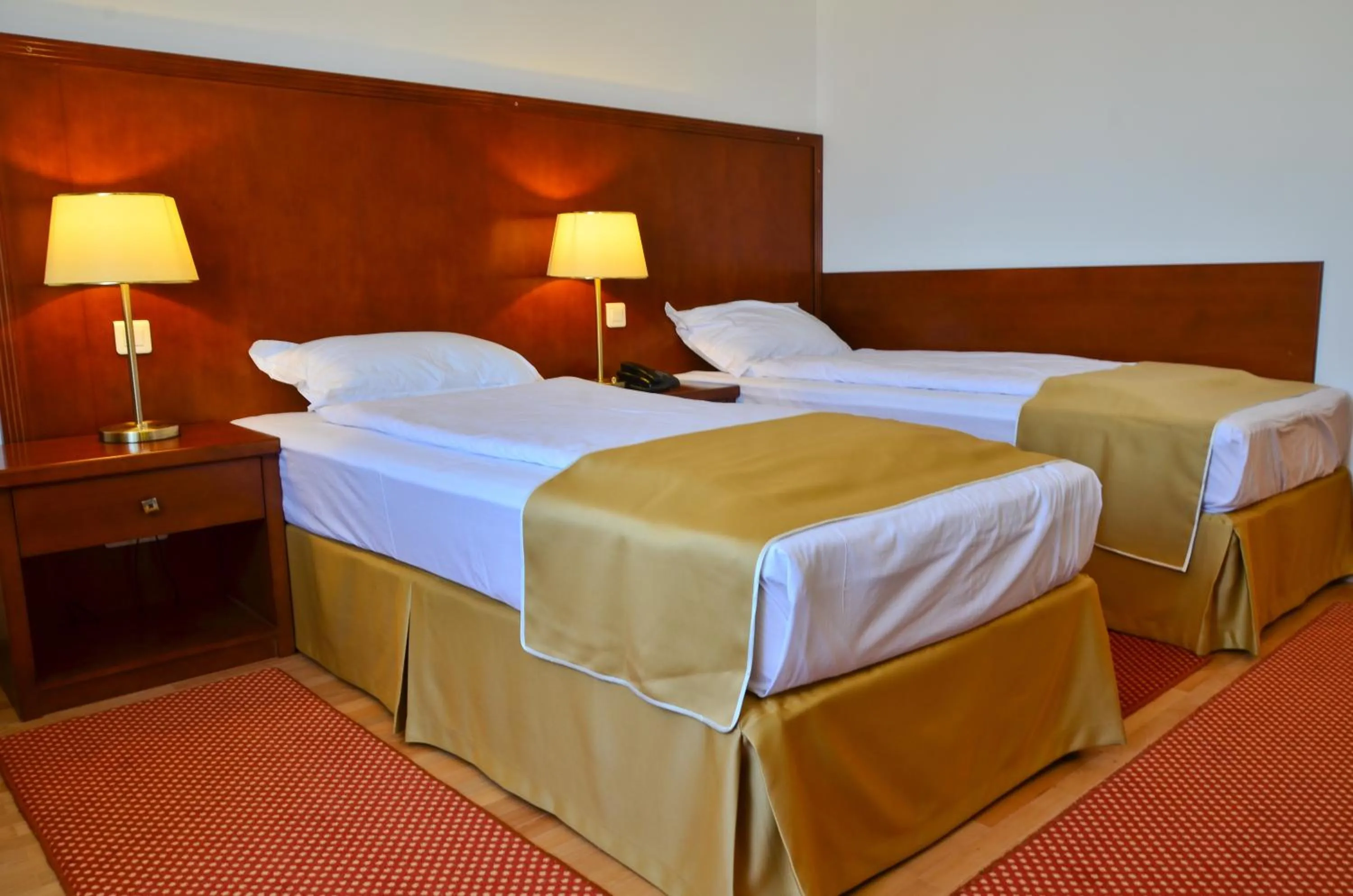 Bed in Hotel Miraj