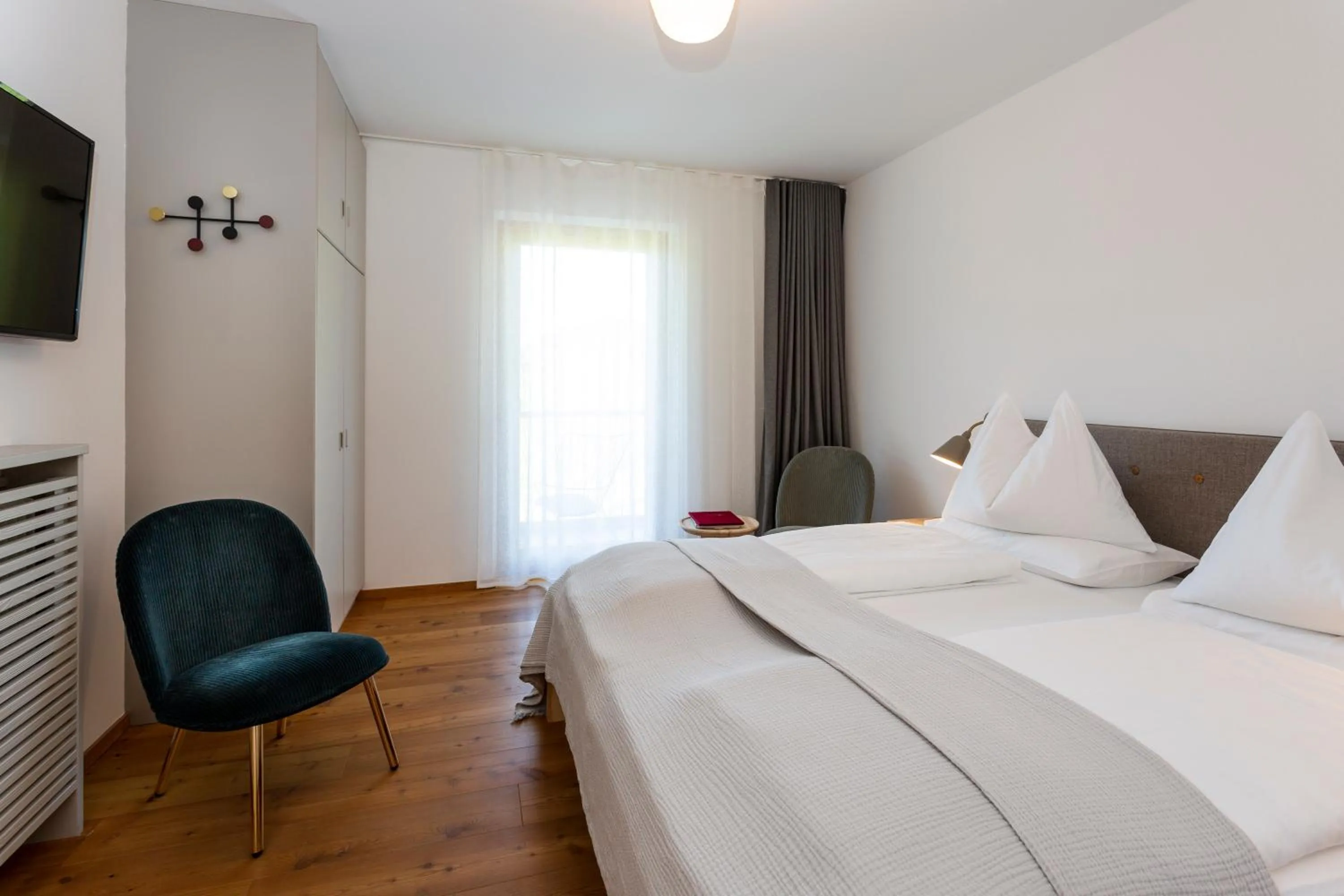 Seating area, Bed in Hotel Tyrol