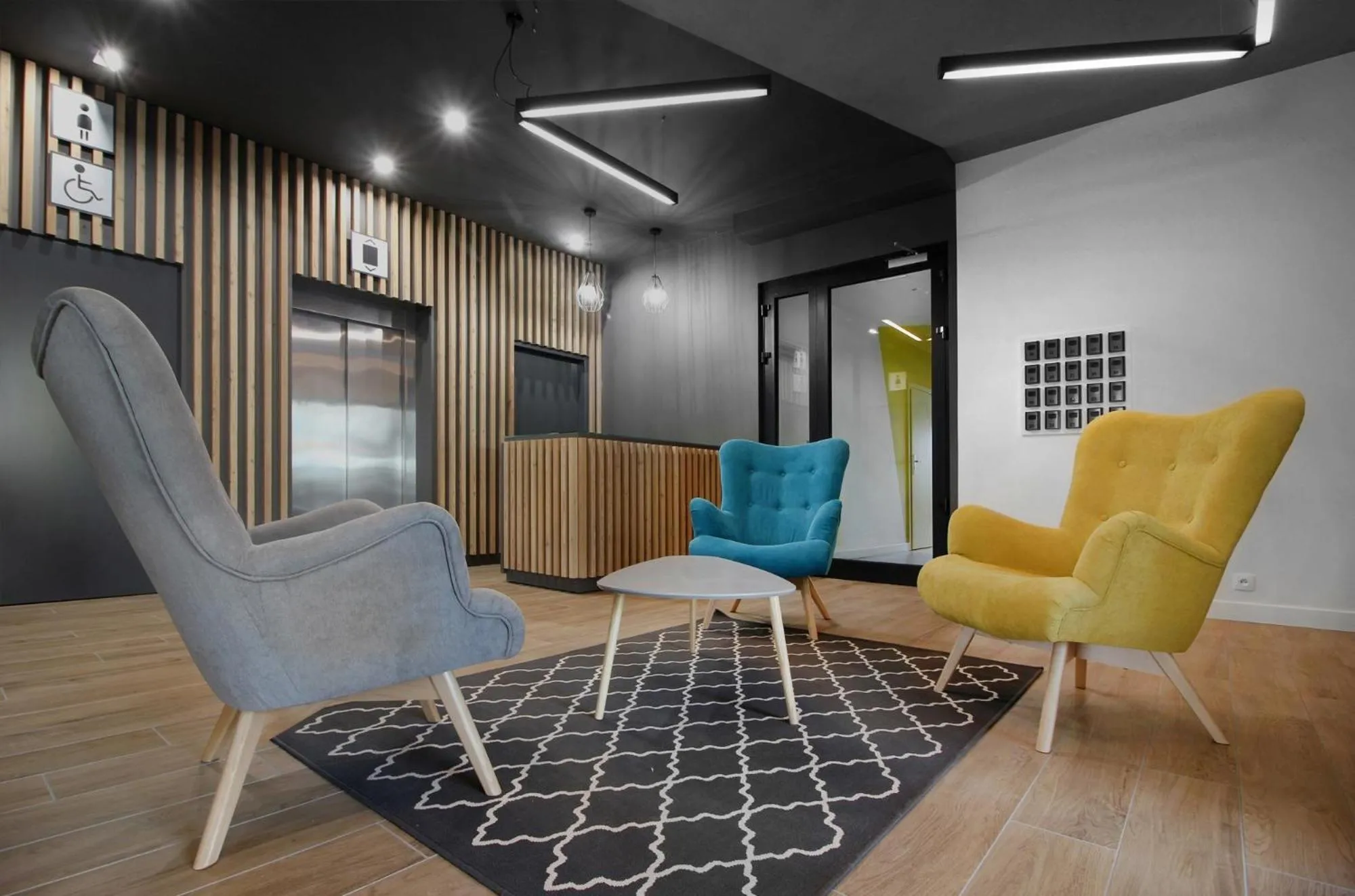 Communal lounge/ TV room in Lemon Plaza Hotel