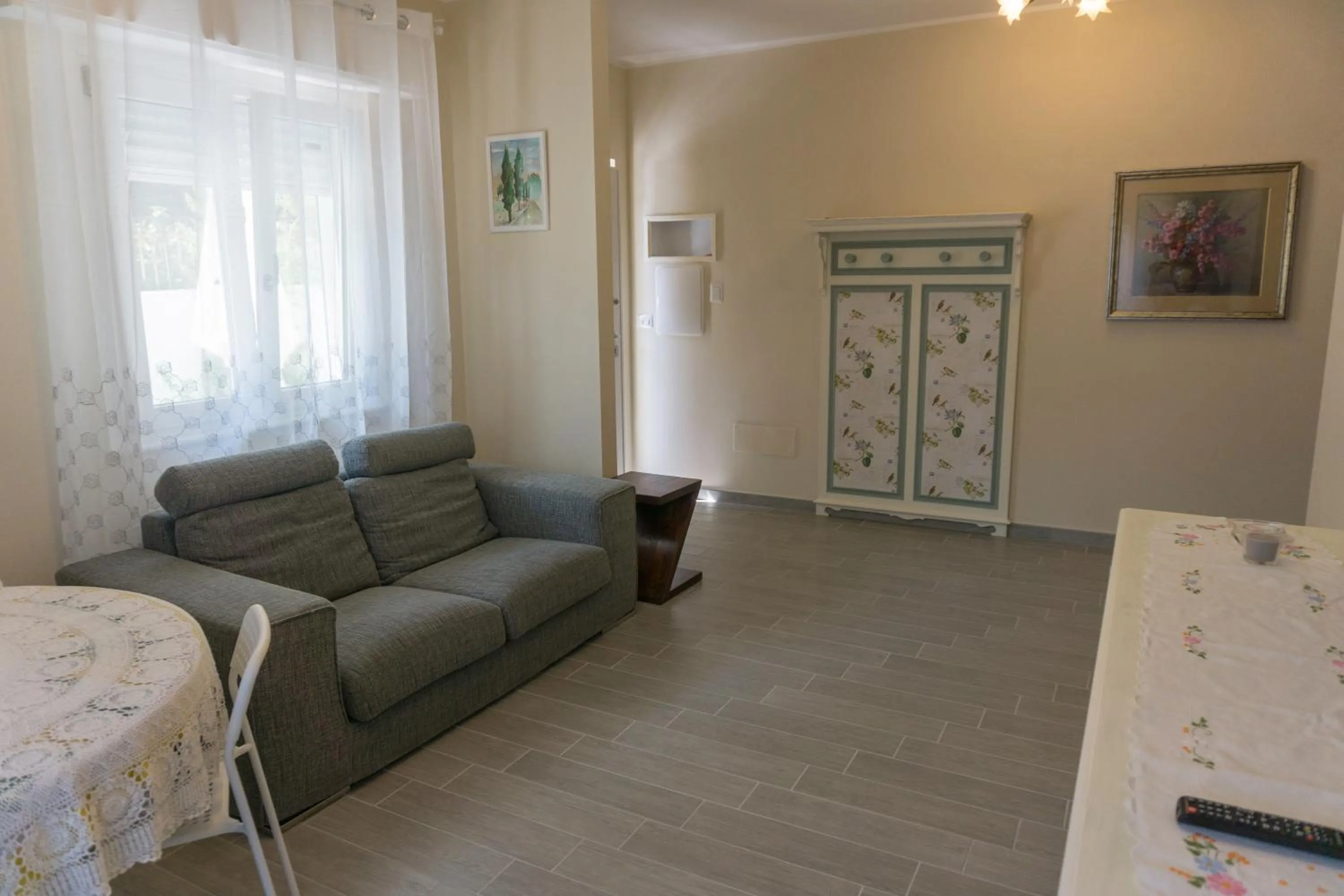 Communal lounge/ TV room in B&B Casa di Mimma