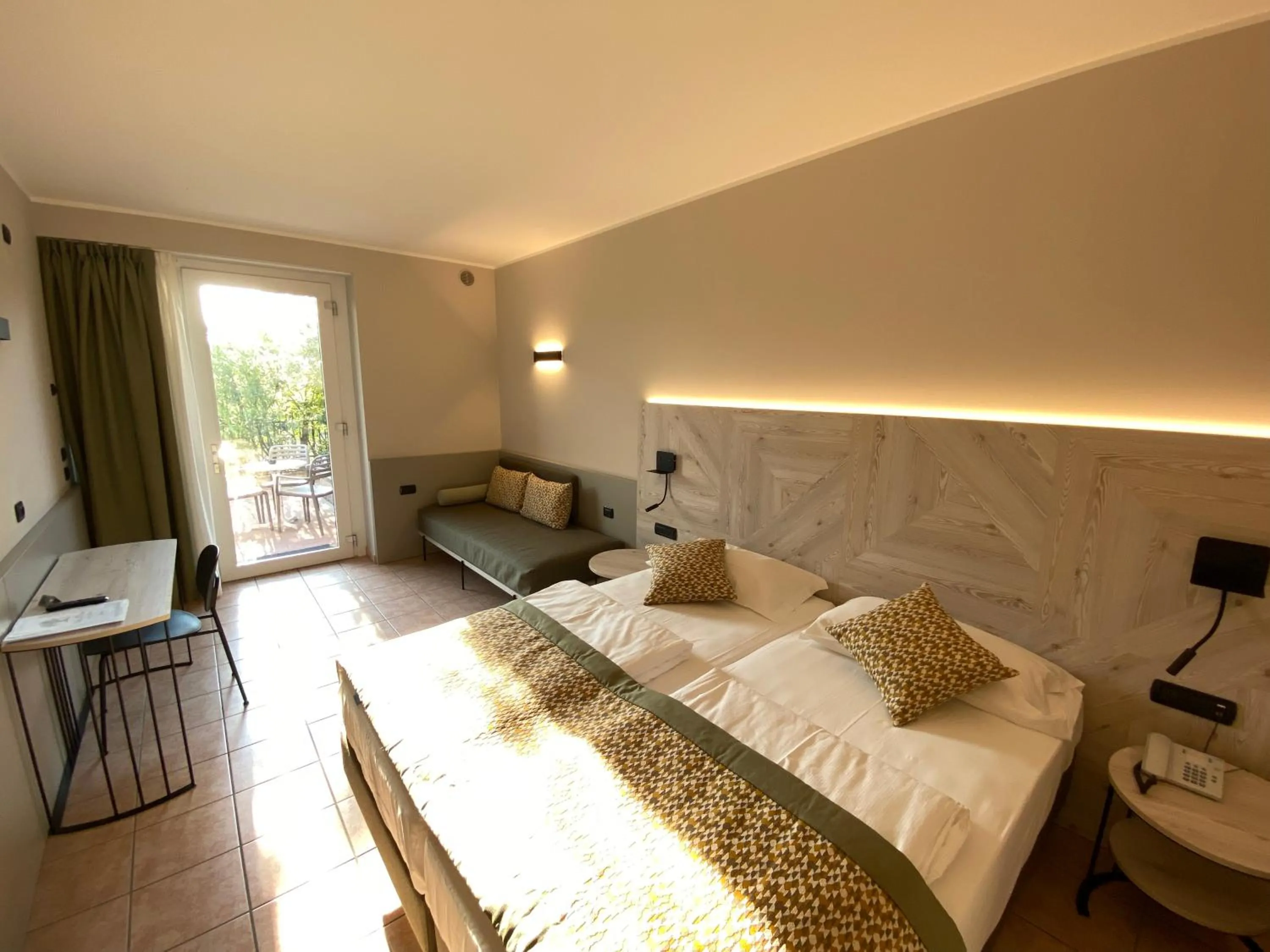 Bed in Hotel Villa Olivo Resort 3S