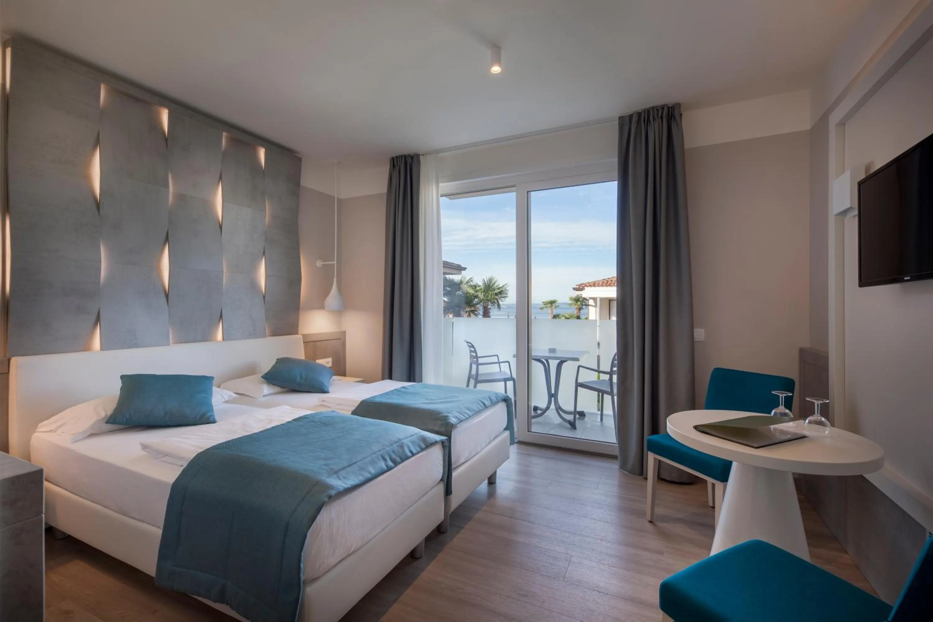 Bed in Hotel Villa Olivo Resort 3S