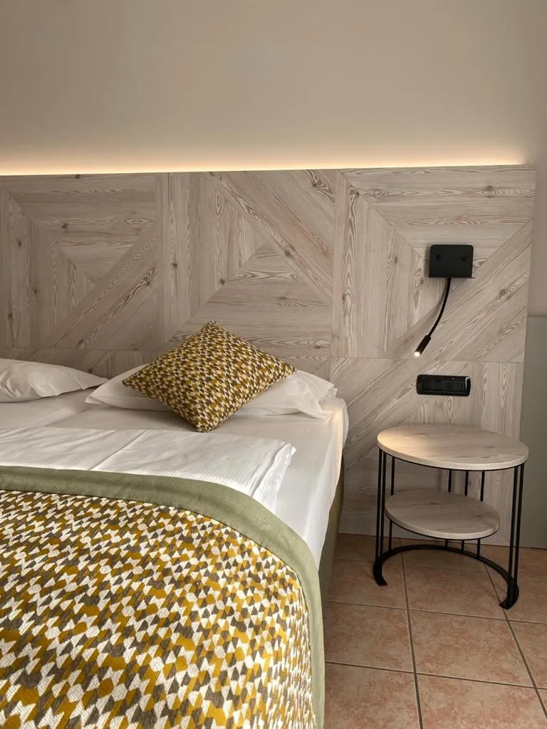 Bed in Hotel Villa Olivo Resort 3S