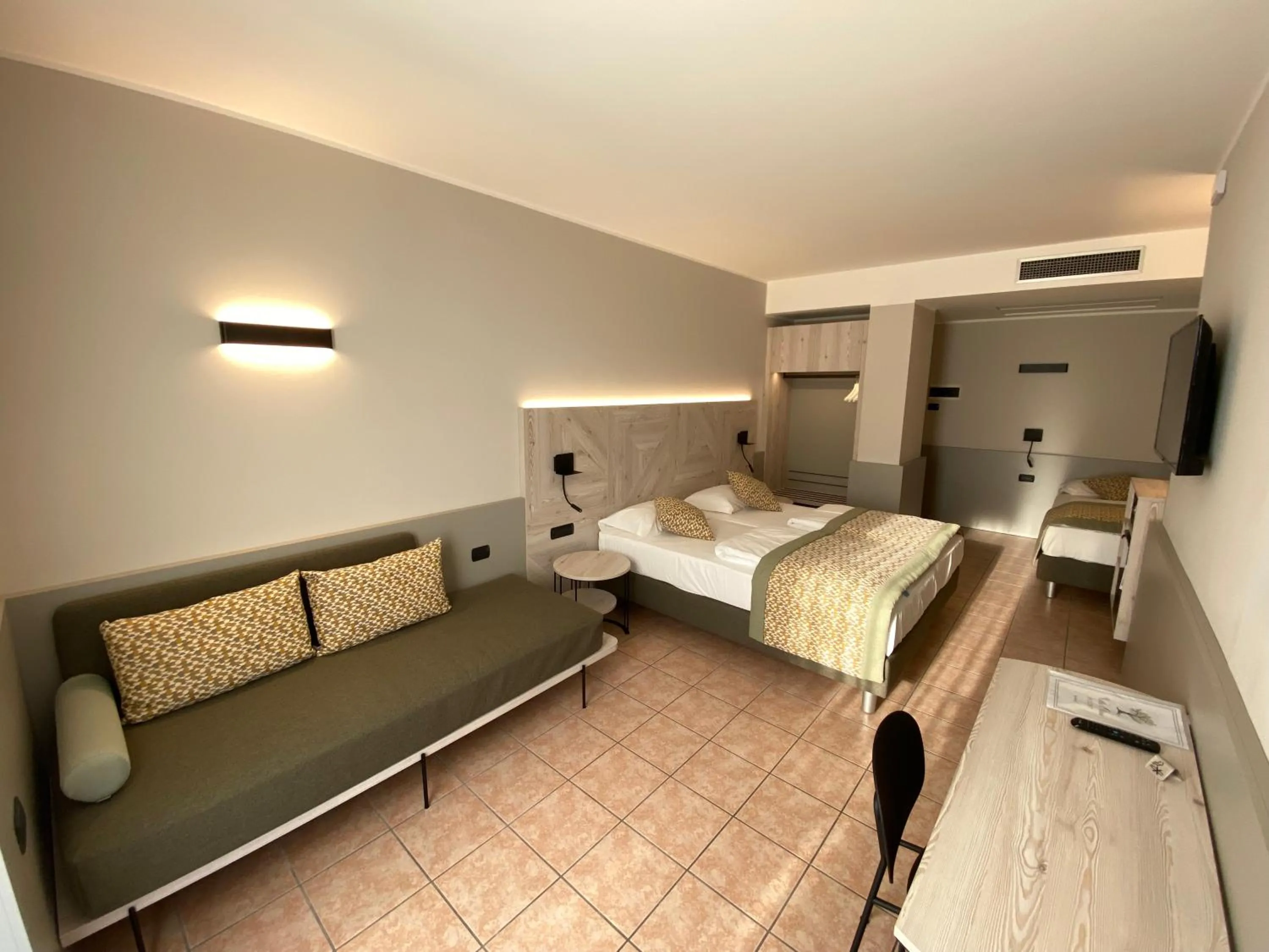 Bed in Hotel Villa Olivo Resort 3S