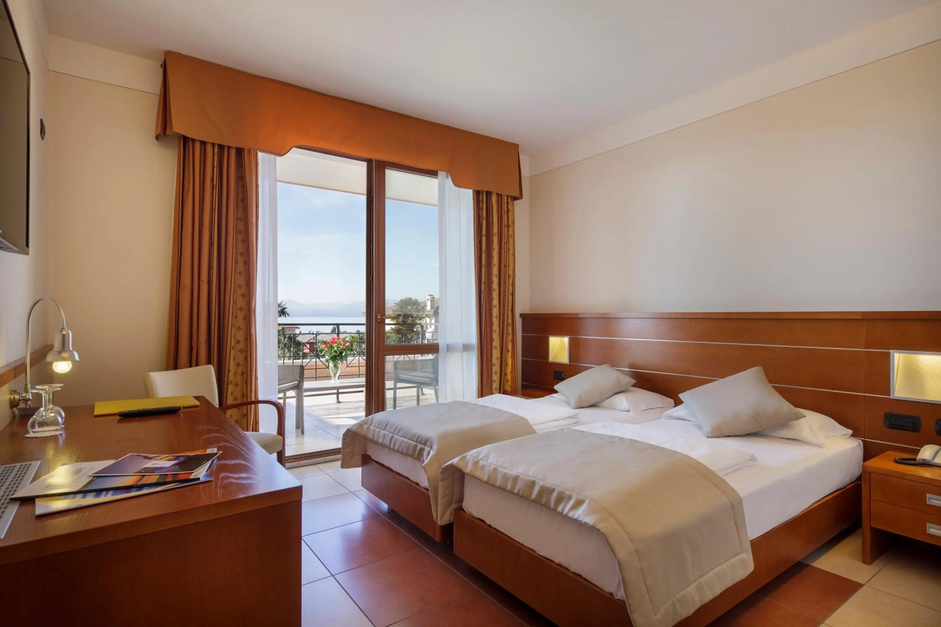Bed in Hotel Villa Olivo Resort 3S