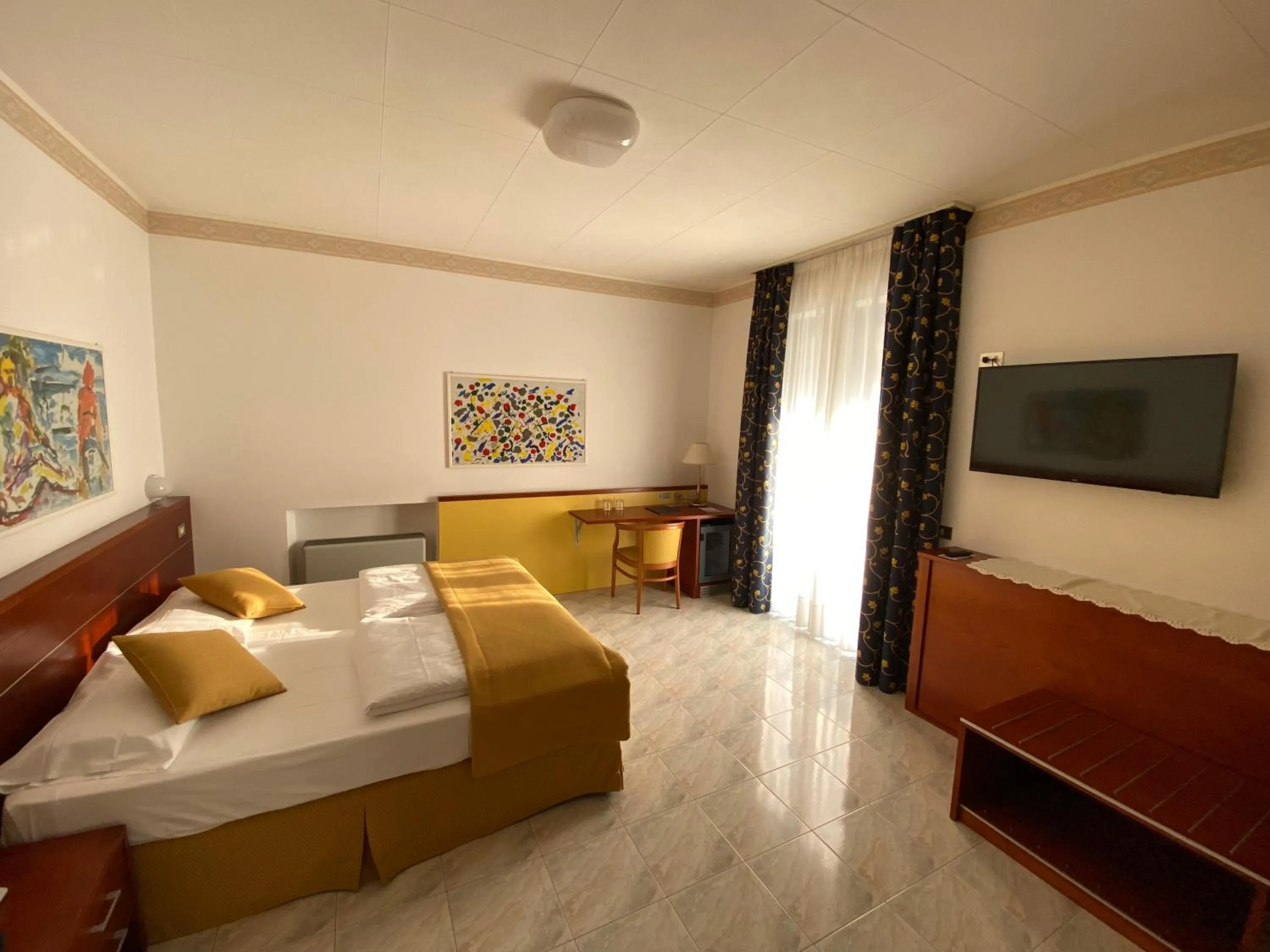 Bed in Hotel Villa Olivo Resort 3S