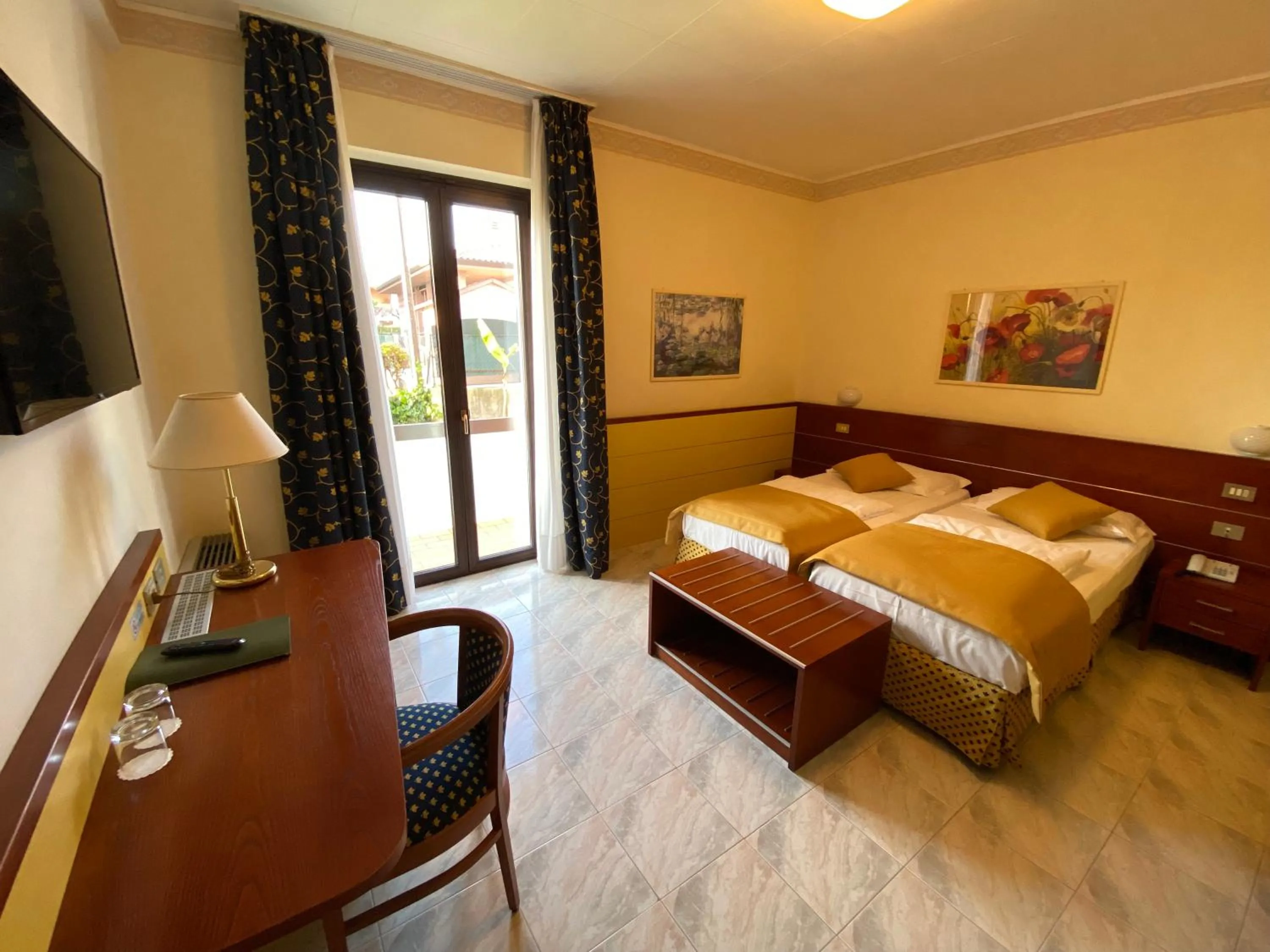 Bed in Hotel Villa Olivo Resort 3S