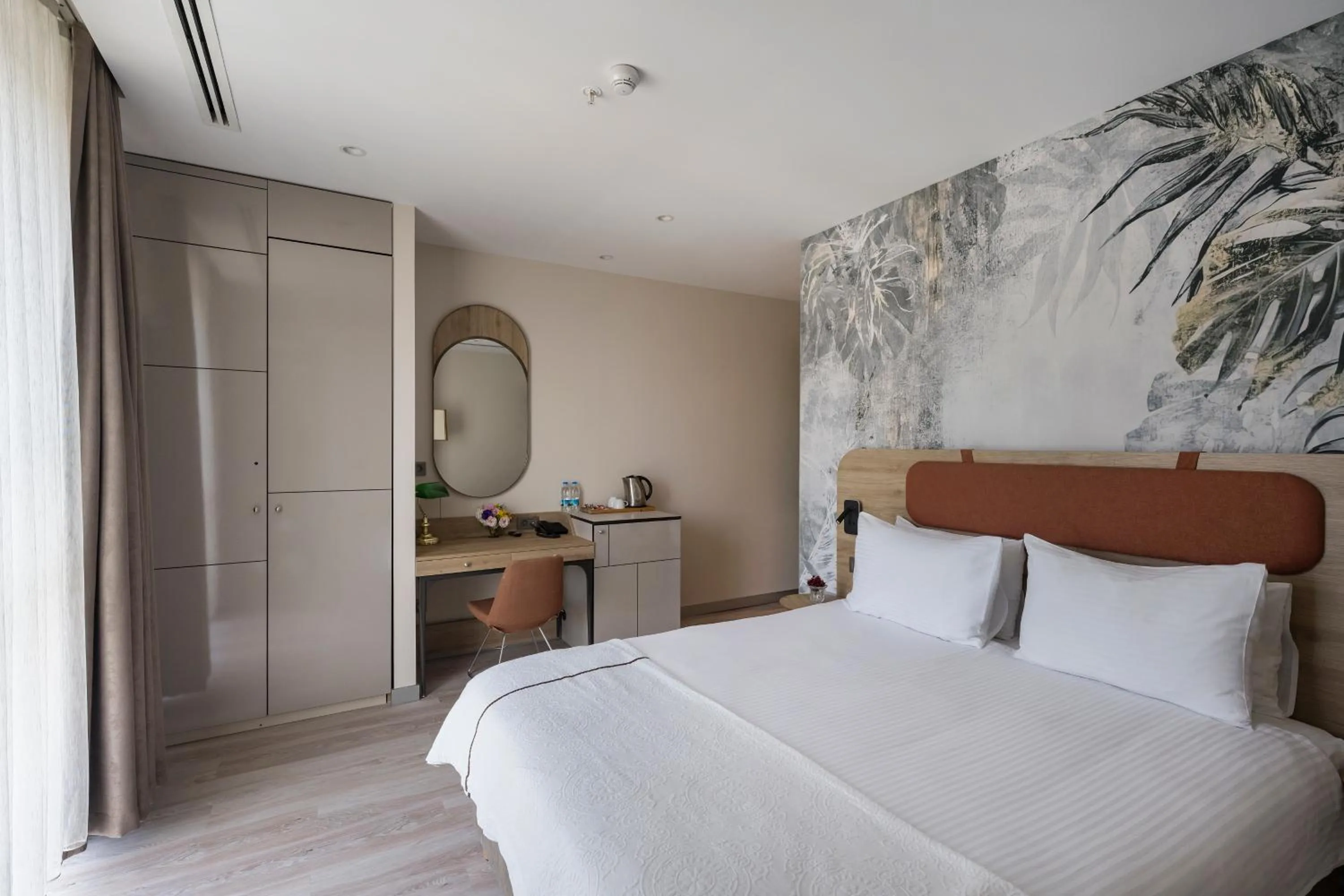 Bed in Upsuites Hotel