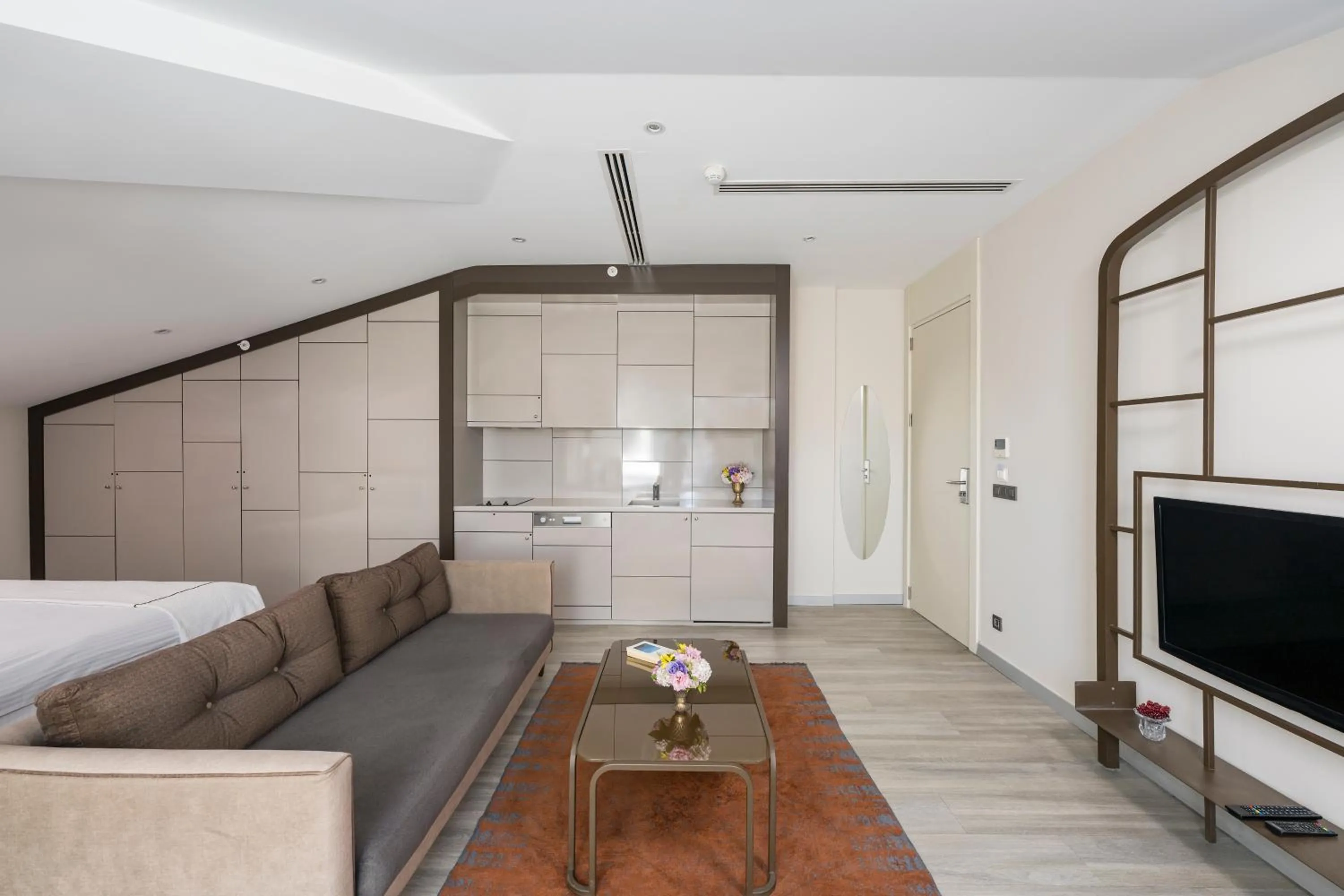 Bed in Upsuites Hotel