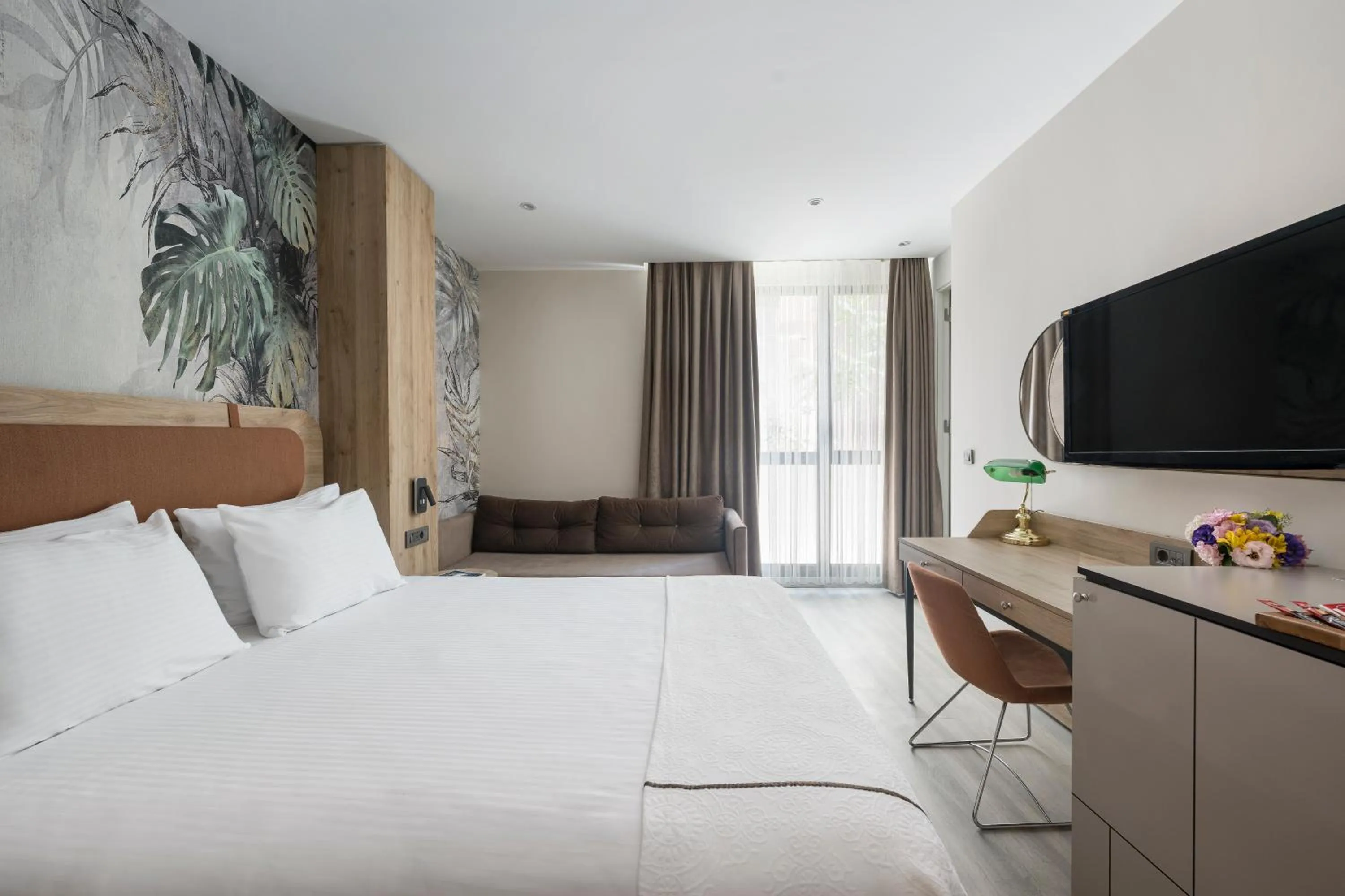 Bed in Upsuites Hotel