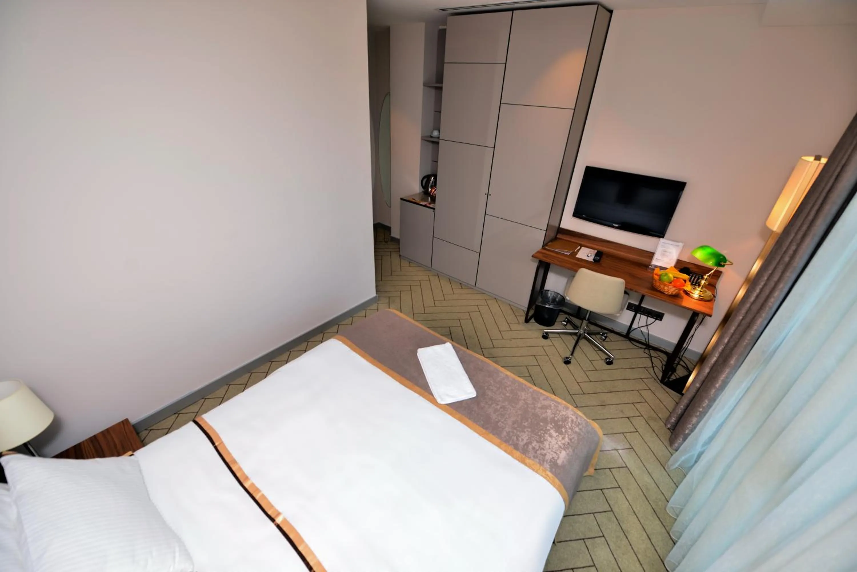 Bedroom, Bed in Upsuites Hotel