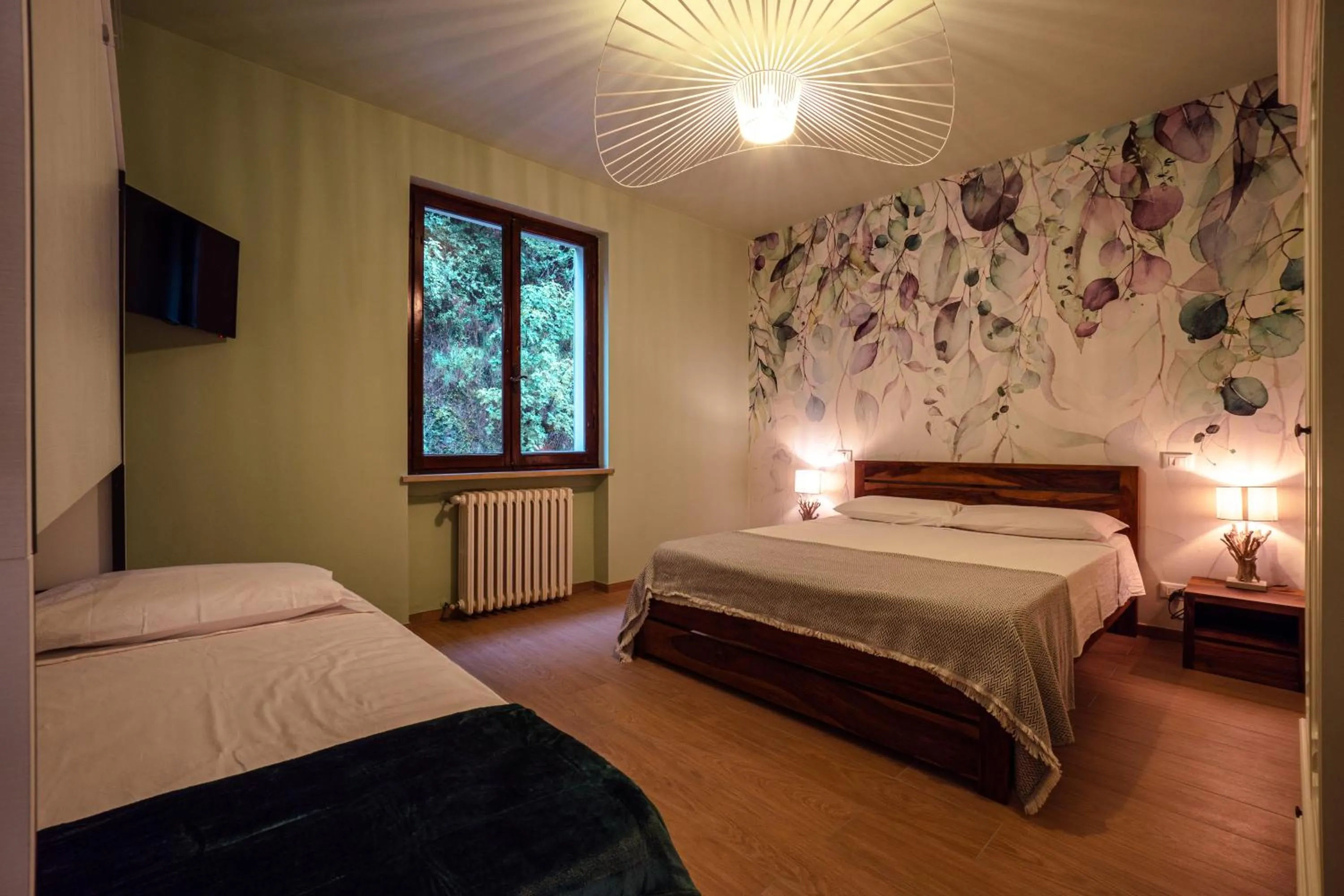 Bed in LA ROSA DEL RABBI Room&Breakfast