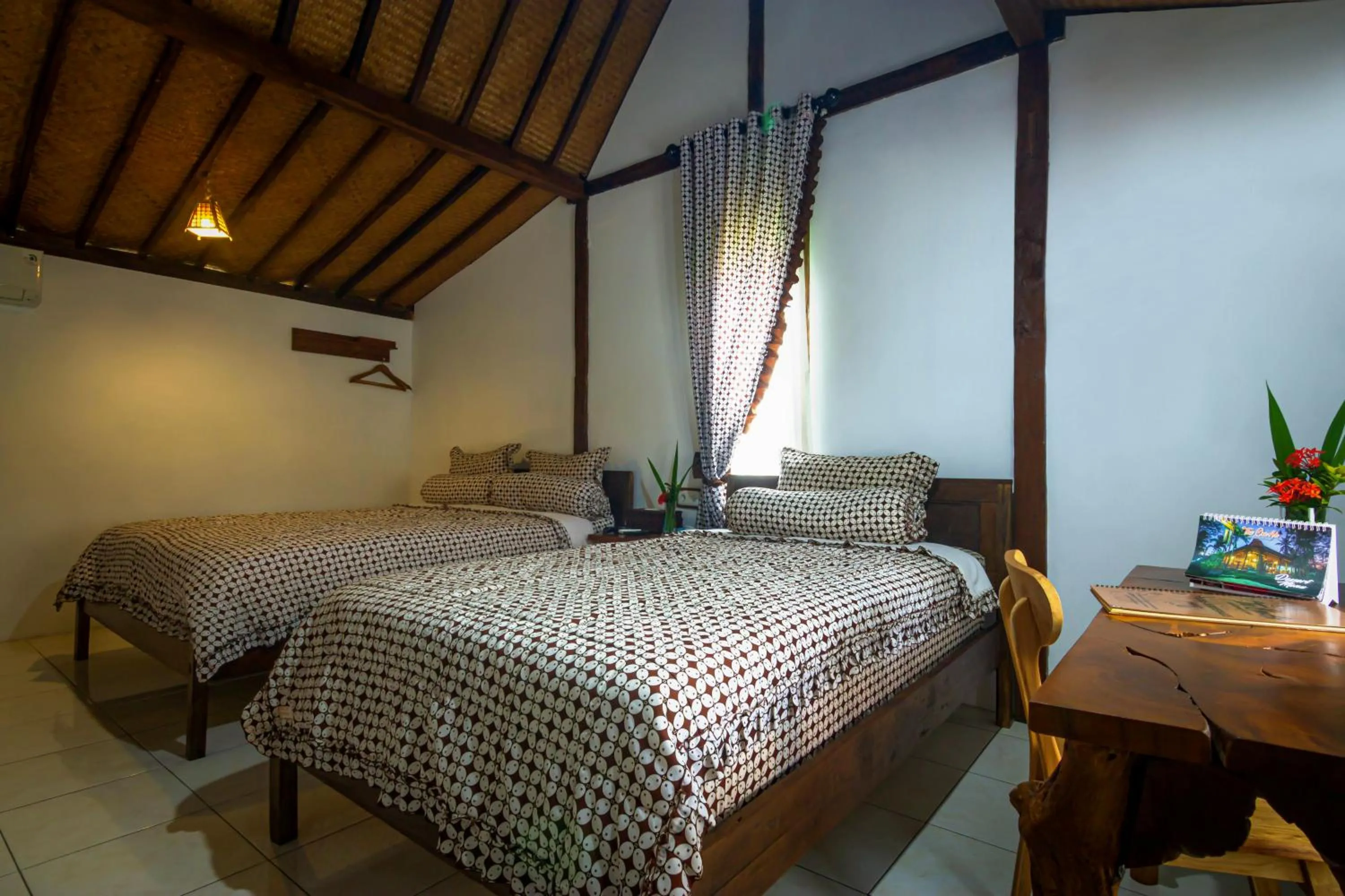 Bed in The Omah Borobudur