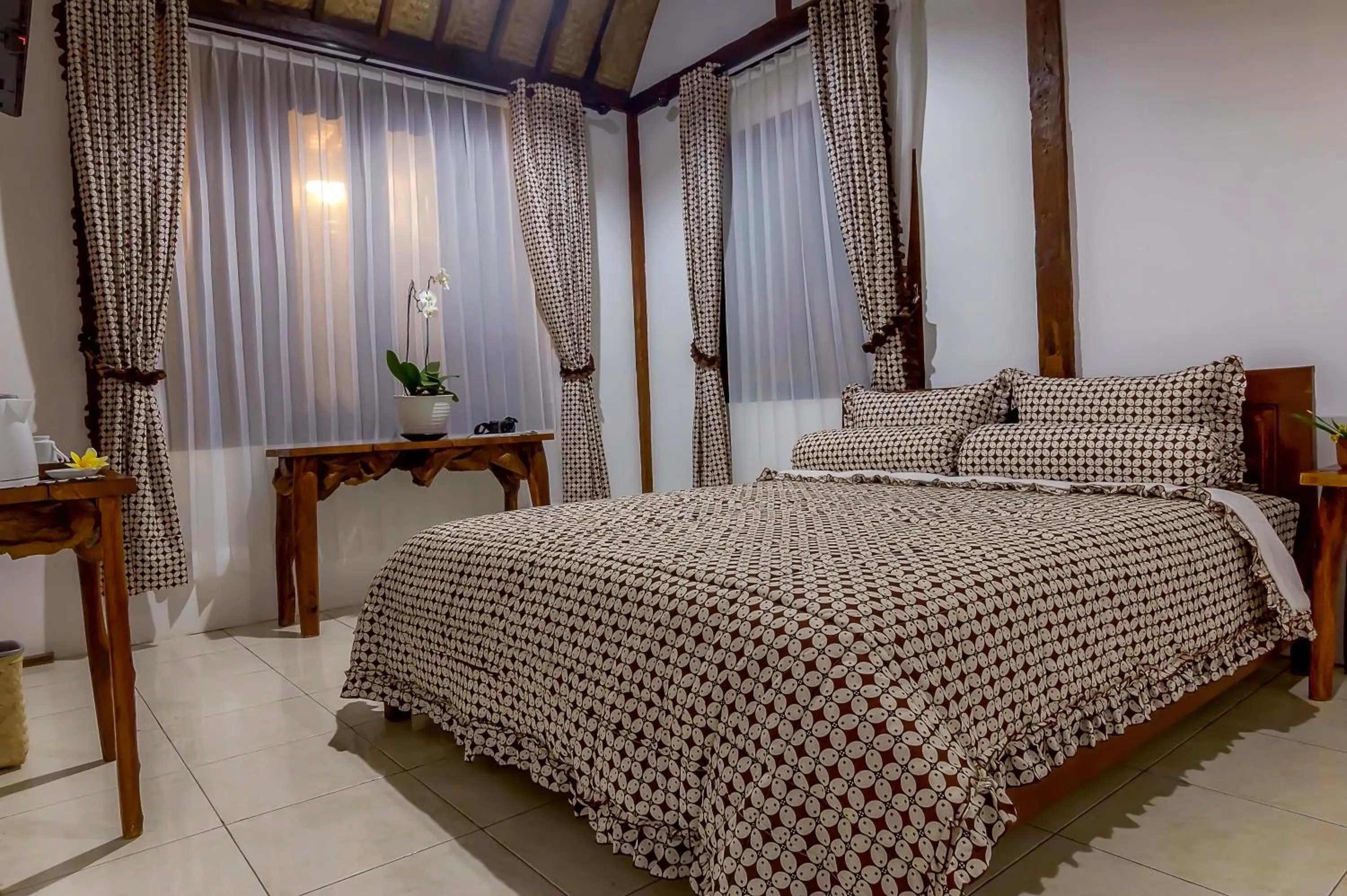 Bed in The Omah Borobudur