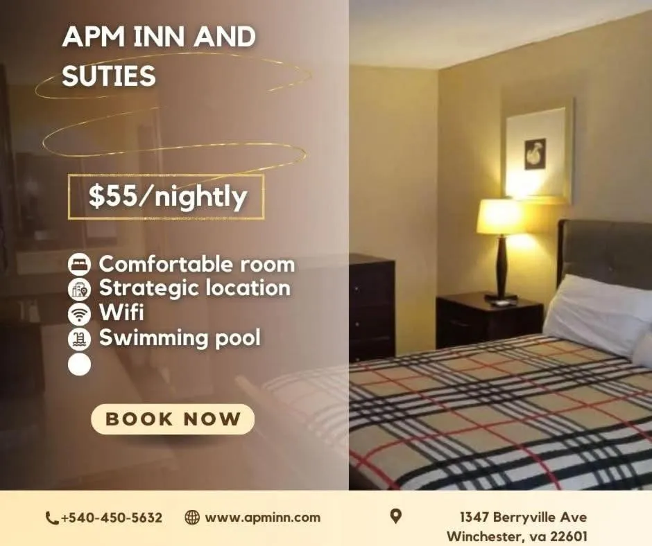 Bed in APM Inn and Suites