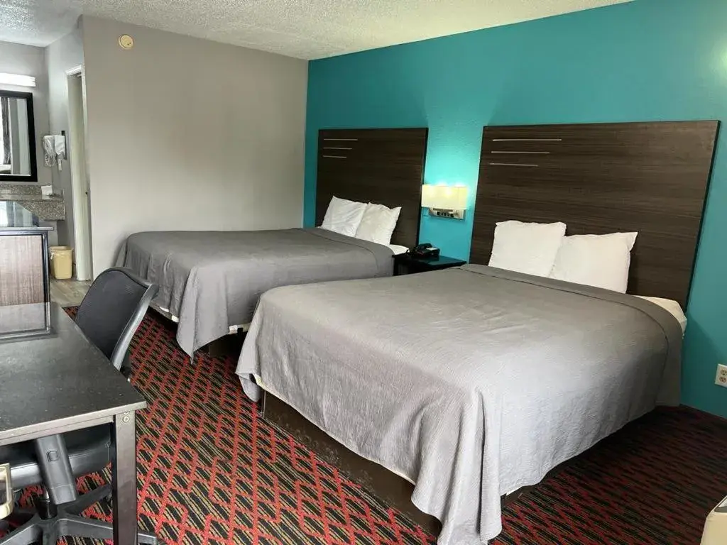 Photo of the whole room, Bed in Key West Inn - Tuscumbia Photo of the whole room, Bed in Key West Inn - Tuscumbia