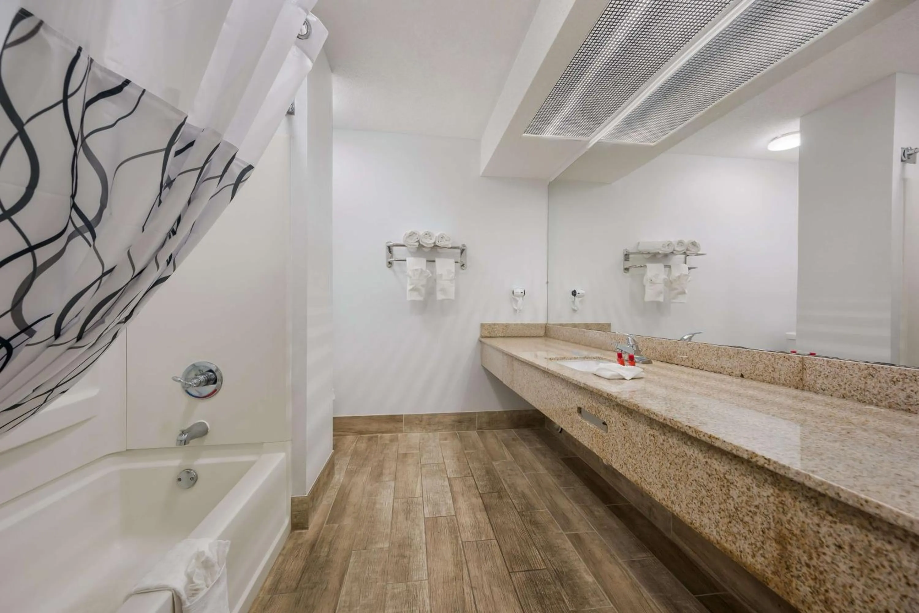 Bathroom in SureStay Hotel By Best Western Tuscaloosa Southeast