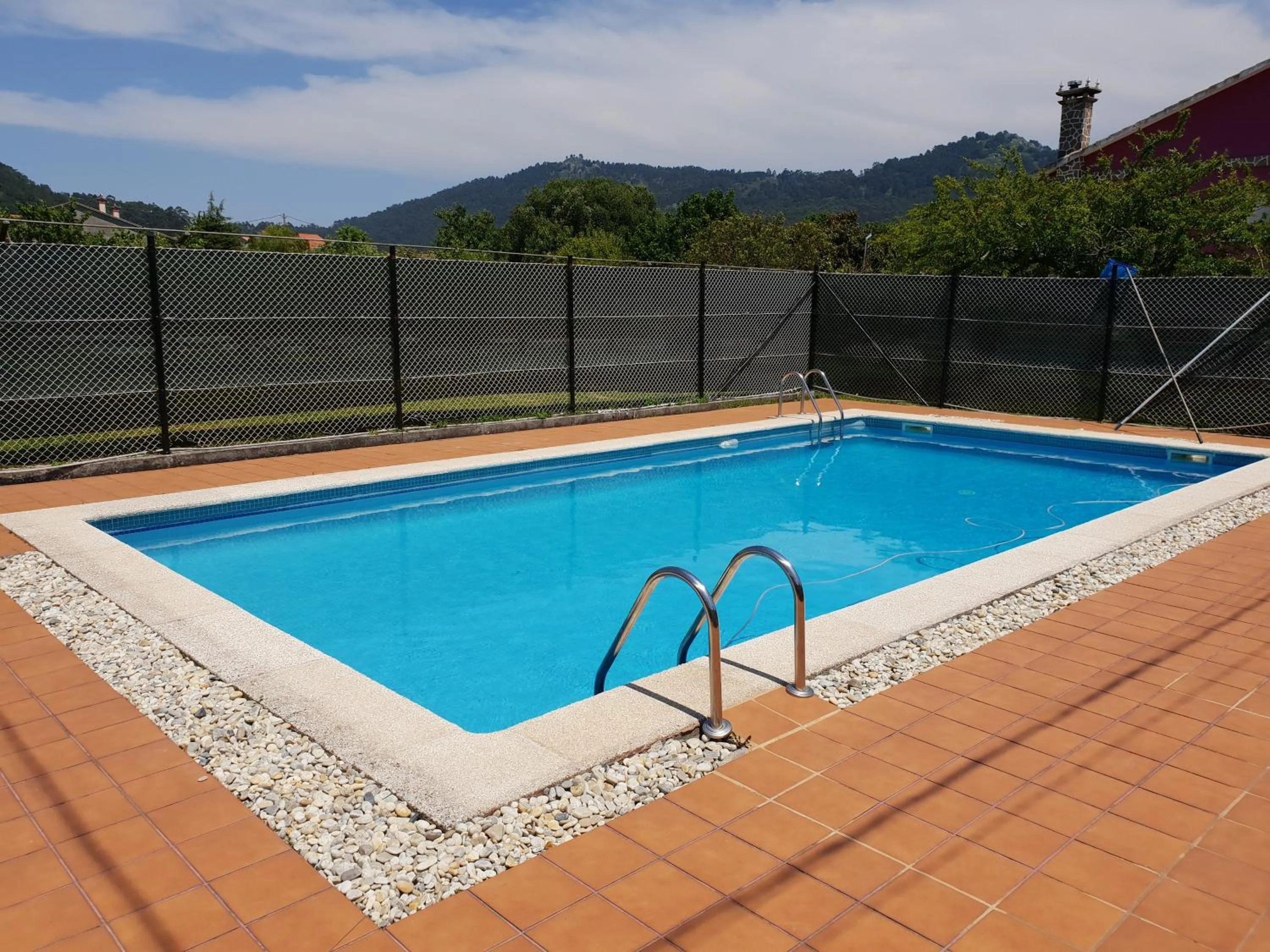 Swimming pool in Apartamentos Ria de Aldan