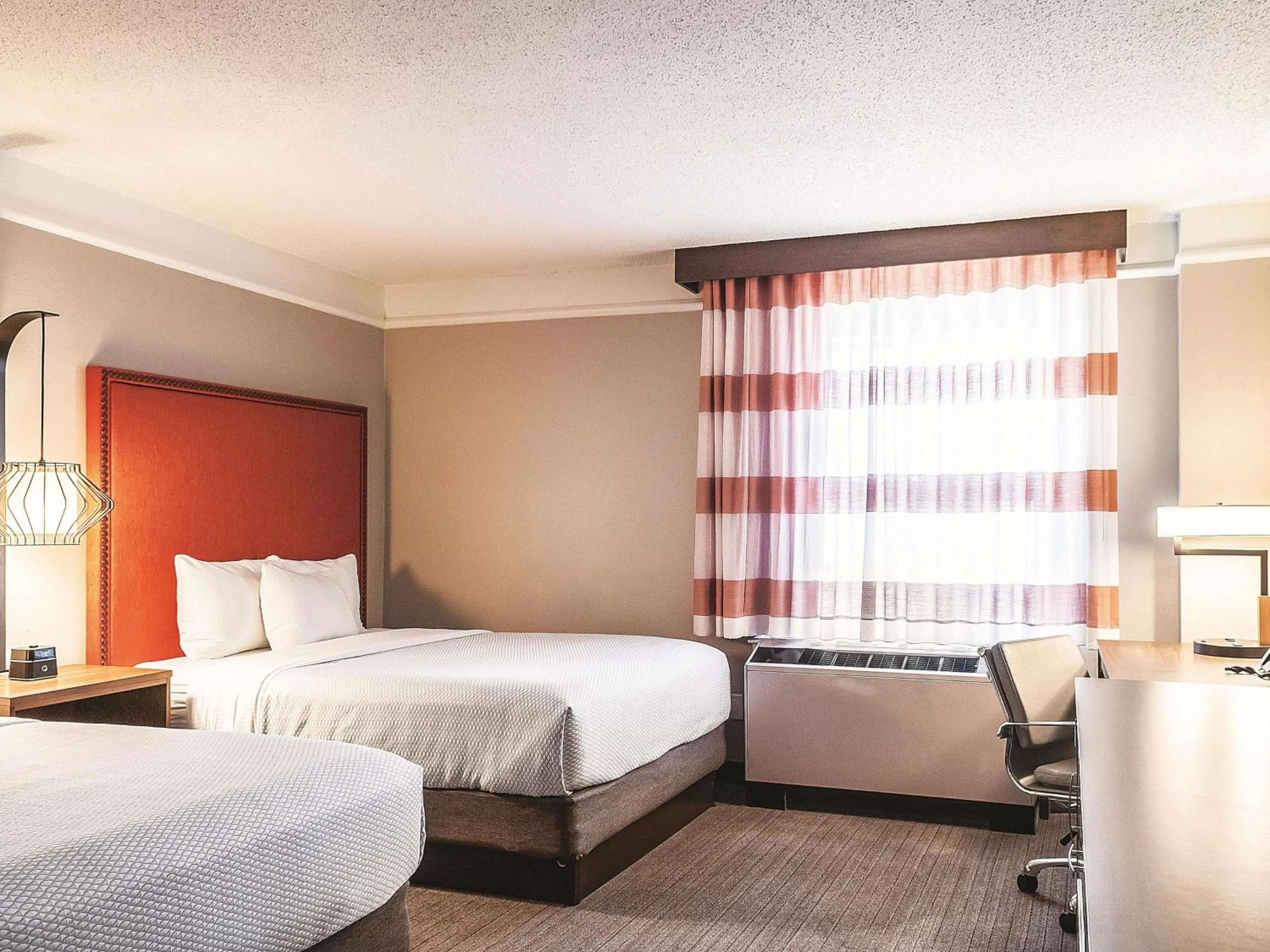 Photo of the whole room, Bed in La Quinta by Wyndham New Orleans Downtown