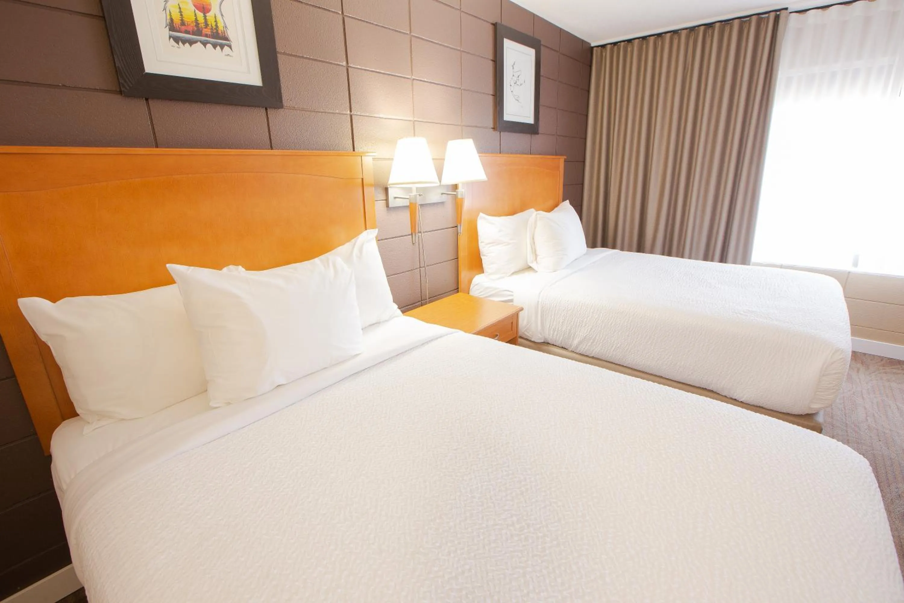 Bed in Neighbourhood Inn Hotels in Bonnyville