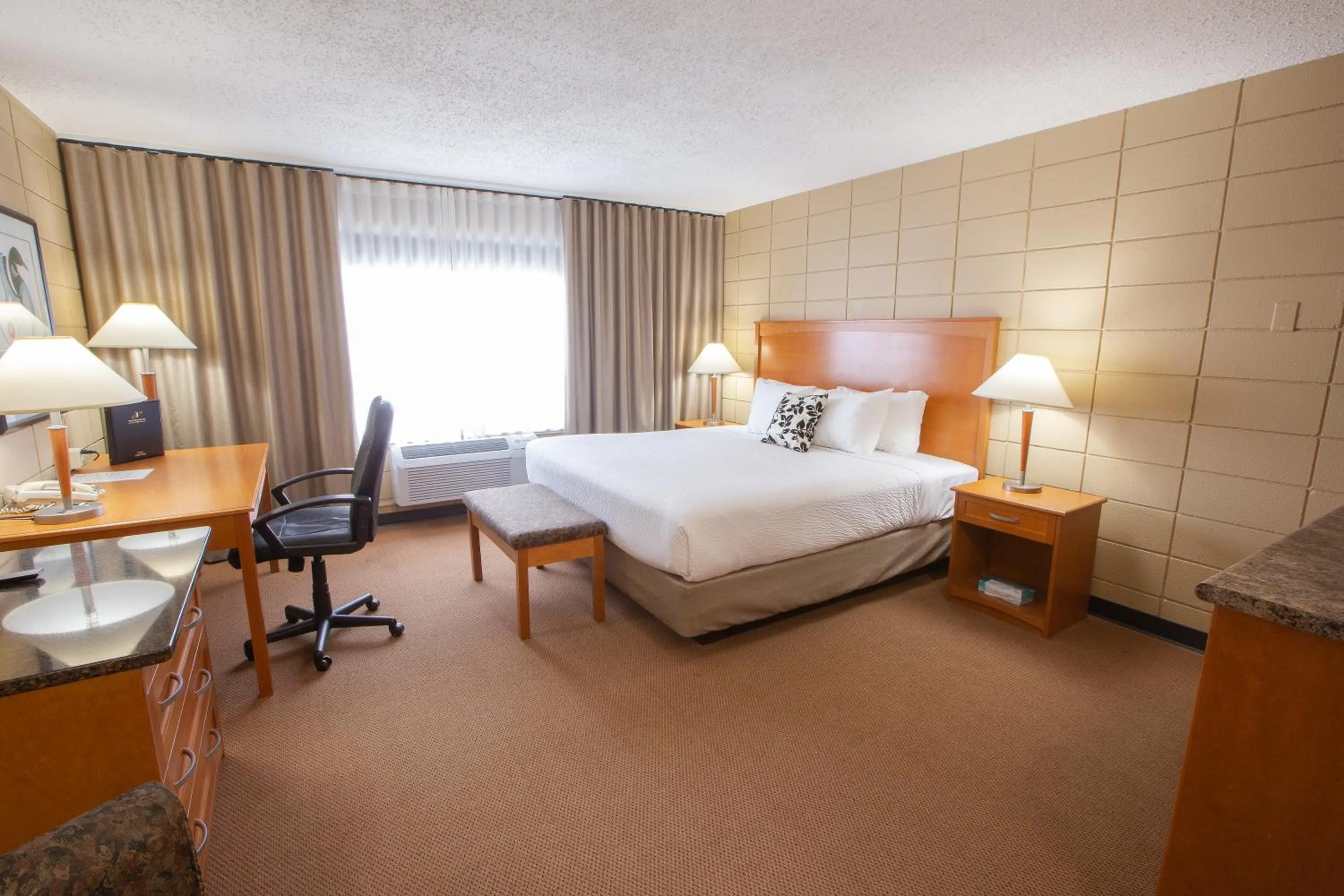 Bed in Neighbourhood Inn Hotels in Bonnyville