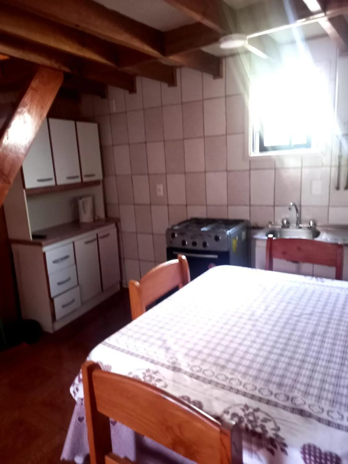 Kitchen or kitchenette in cabañas Cadiz