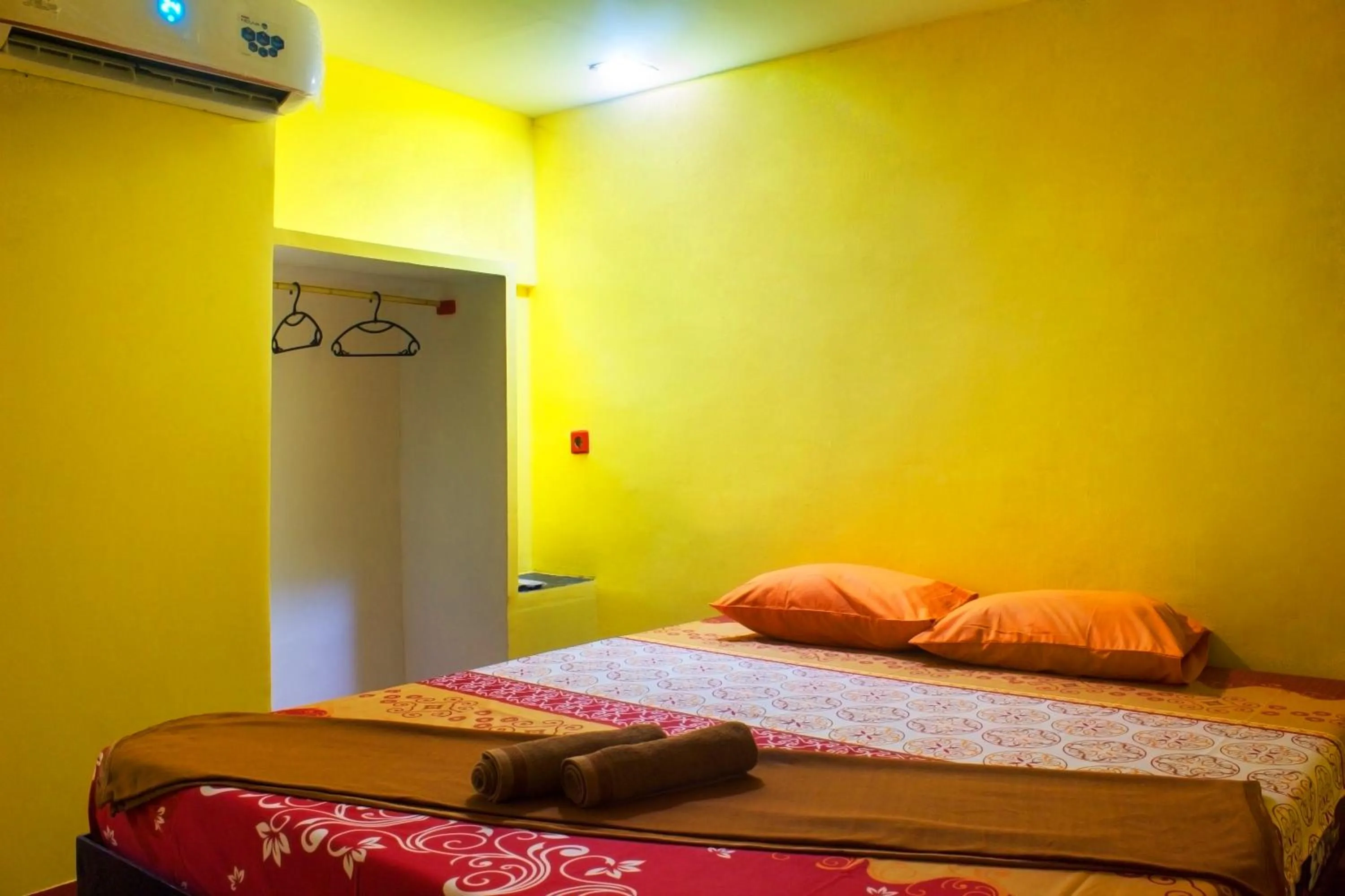 Bed in New Priok Indah Syariah Hotel