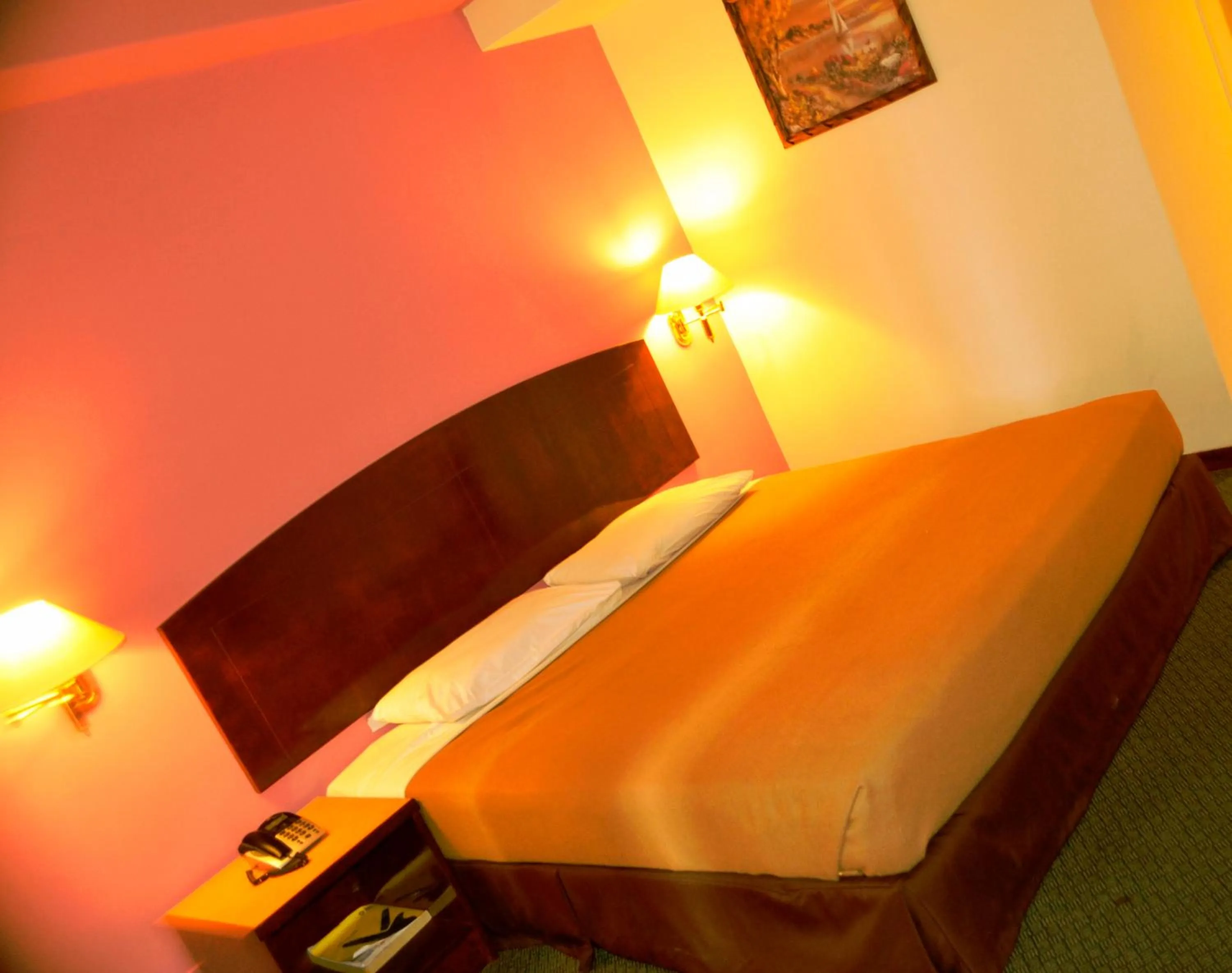 Bed in Hotel Caliber