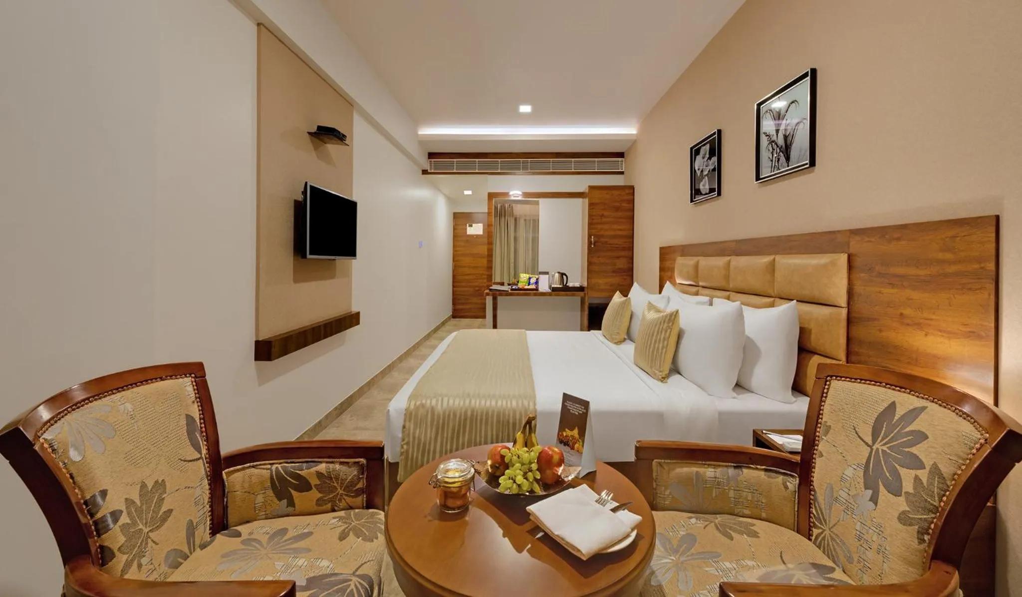 Seating area, Bed in The Fern Residency, Bhuj