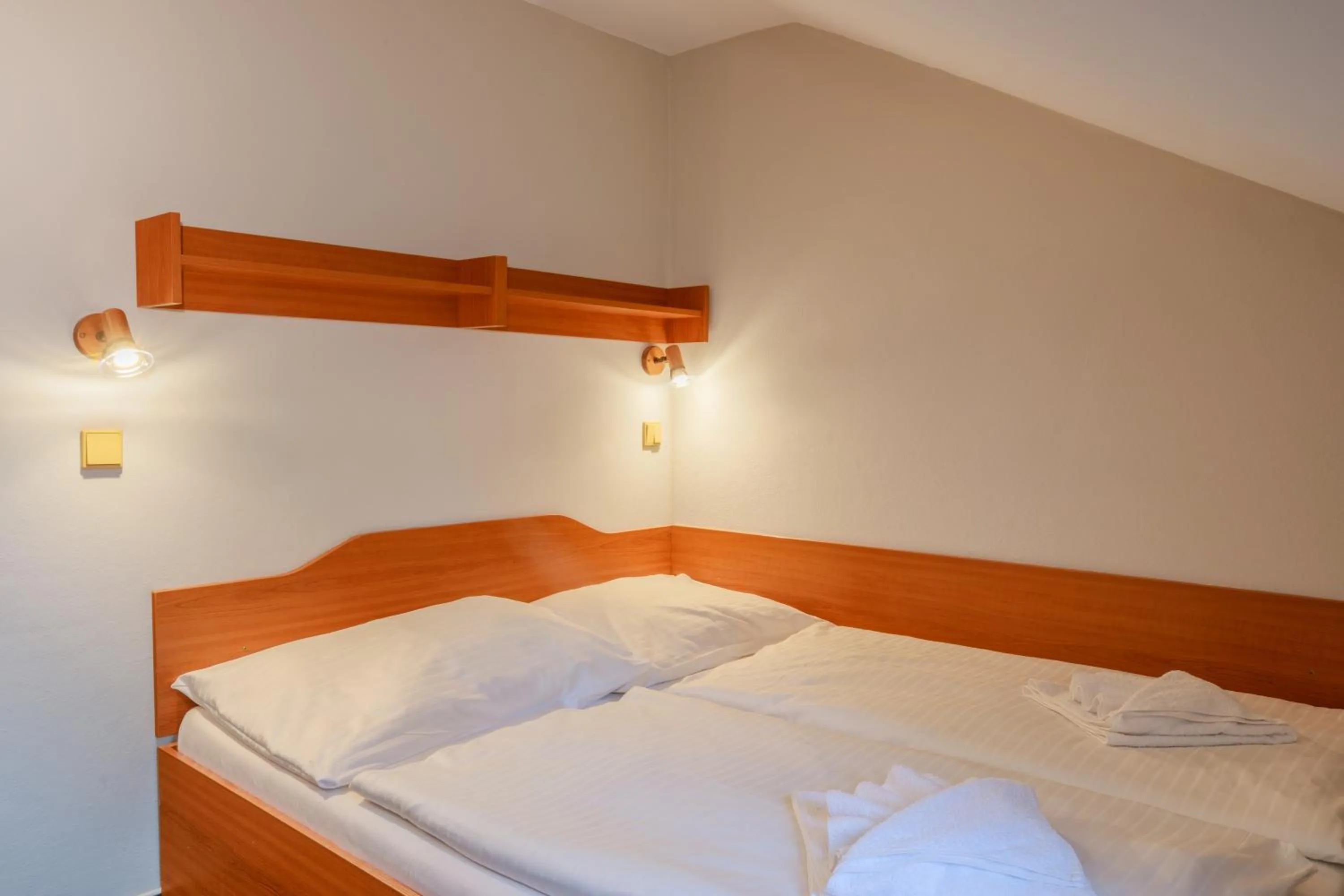 Bed in Hotel Jitřenka