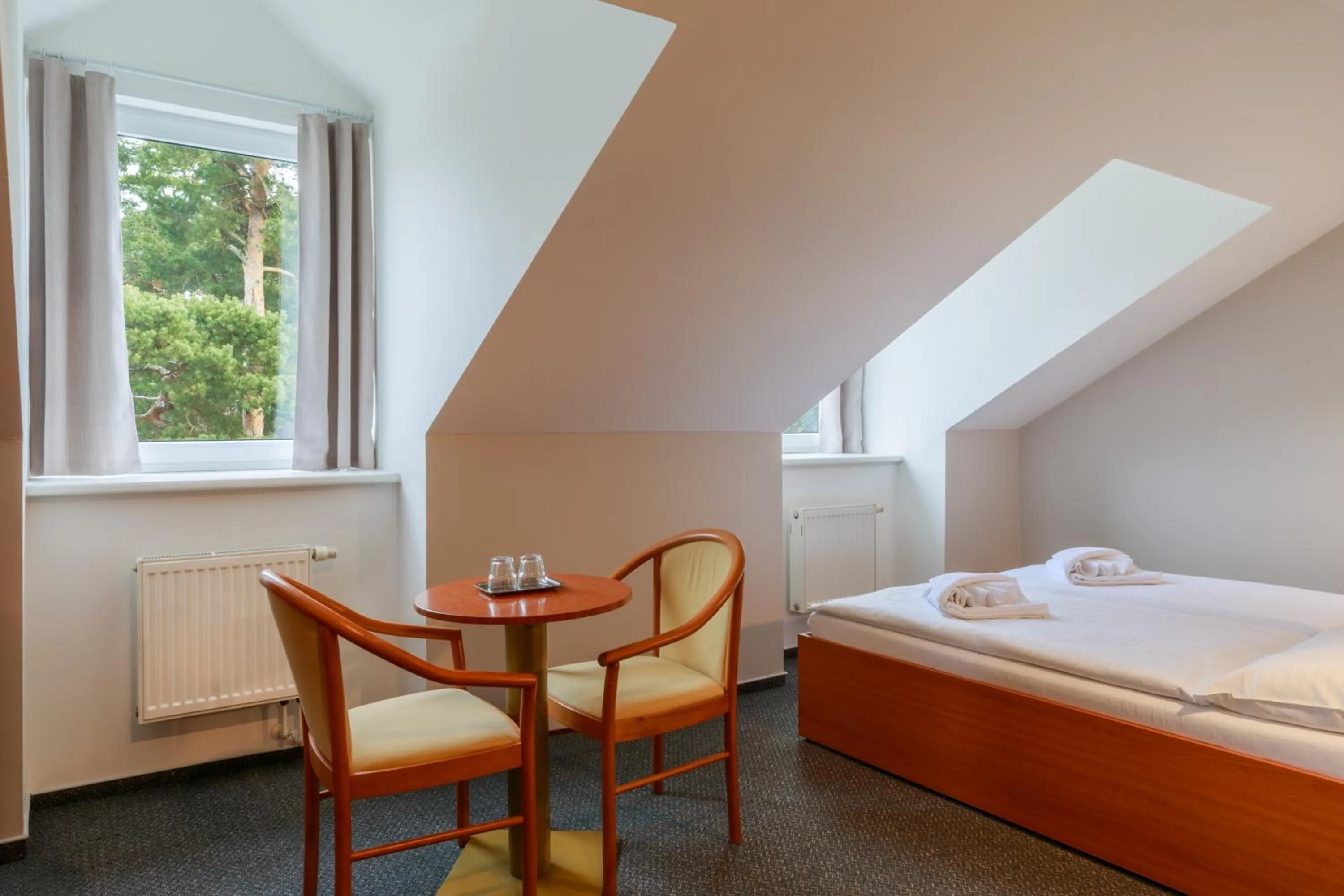 Bed in Hotel Jitřenka