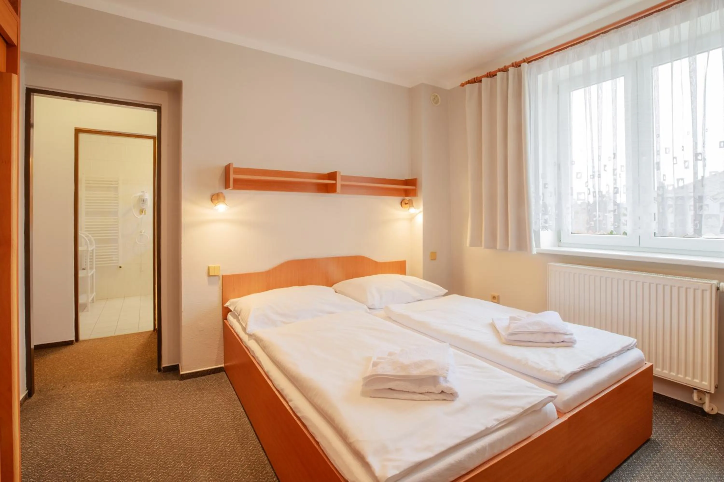 Bed in Hotel Jitřenka