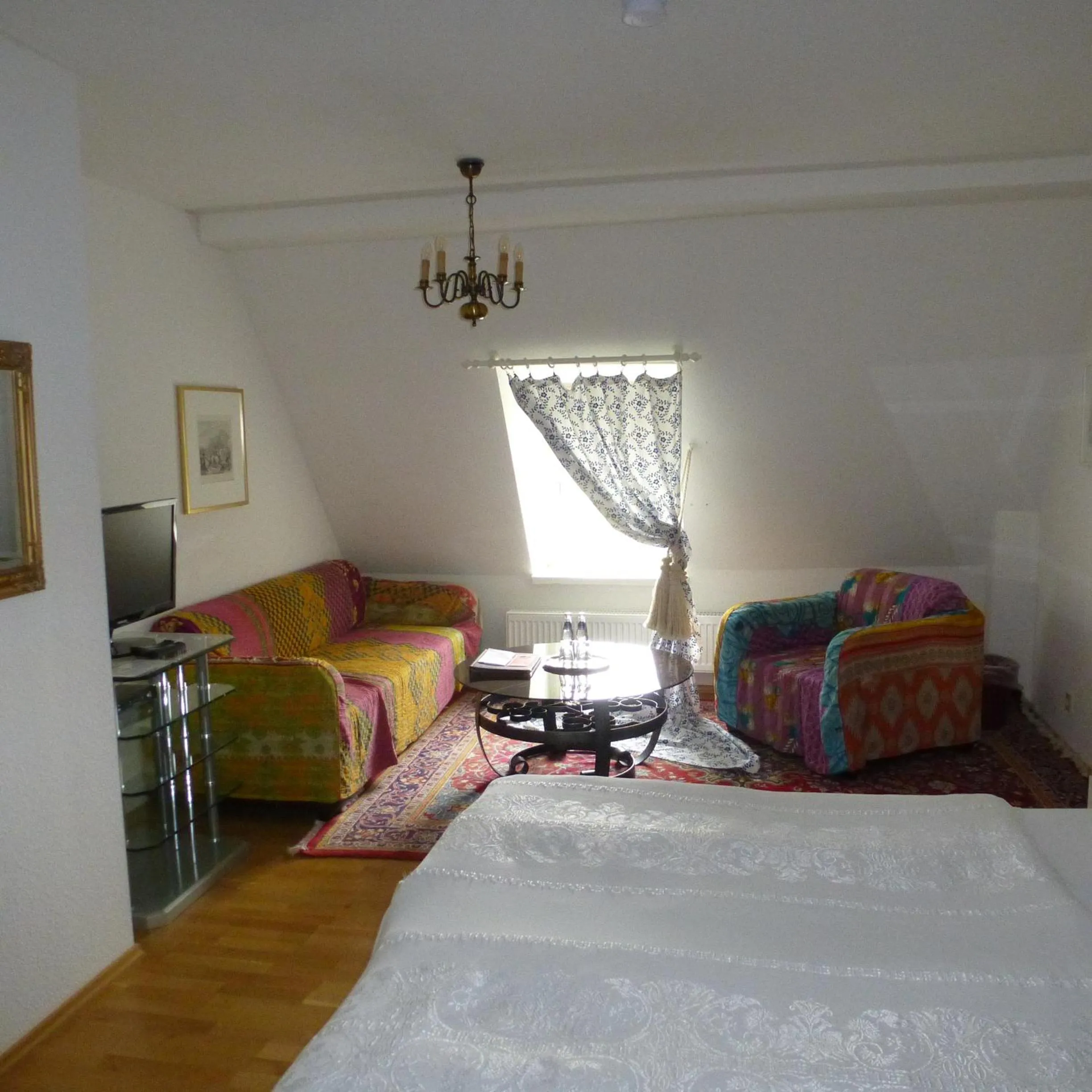 Seating area, Bed in Schloss Hotel Wallhausen