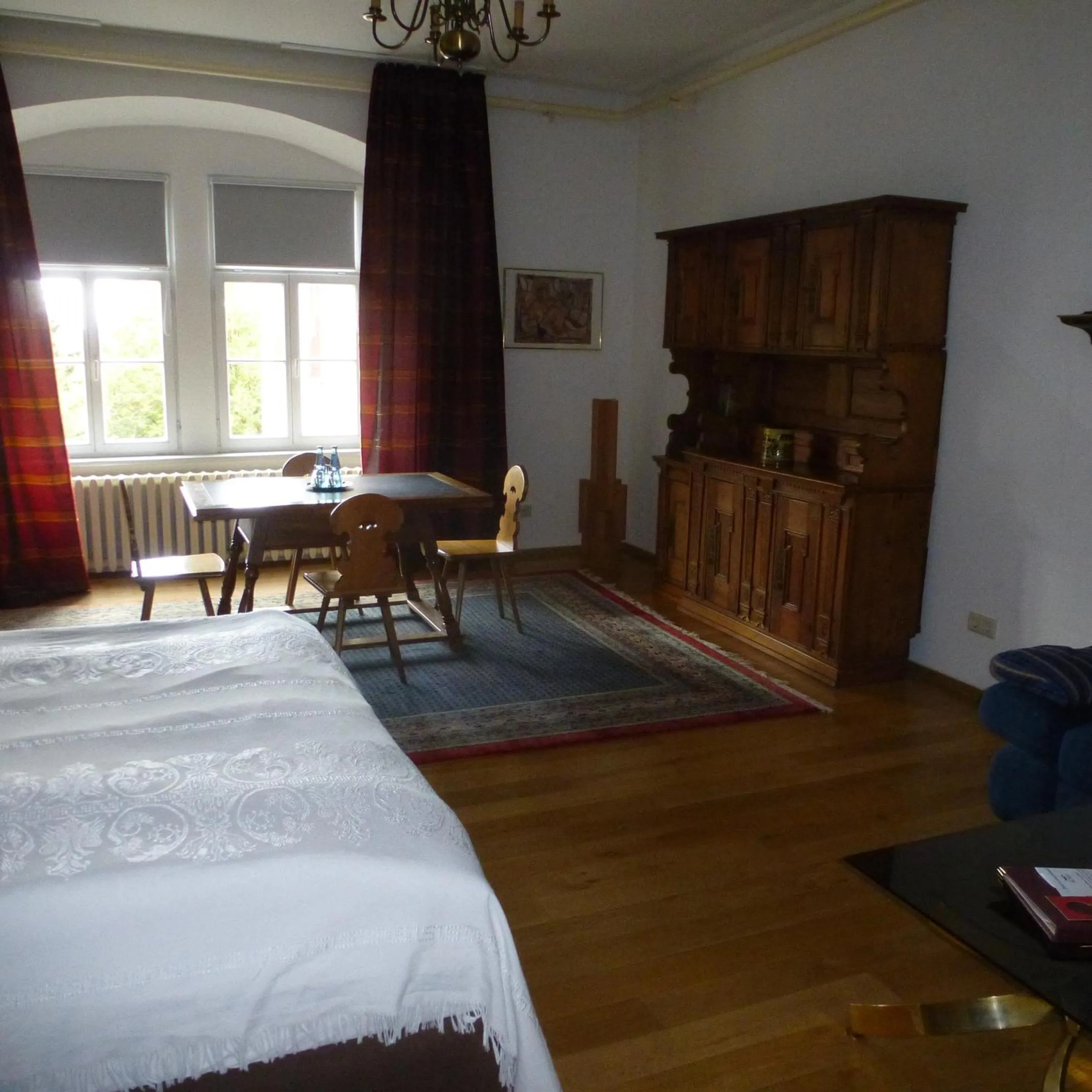 Seating area, Bed in Schloss Hotel Wallhausen