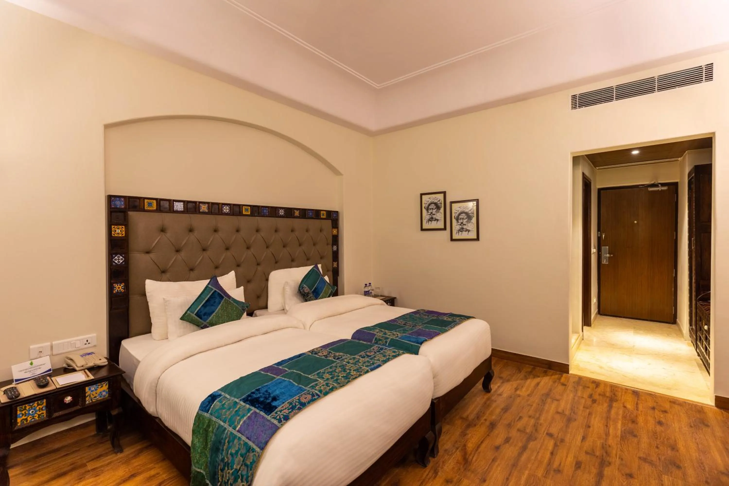Bed in Sairafort Sarovar Portico