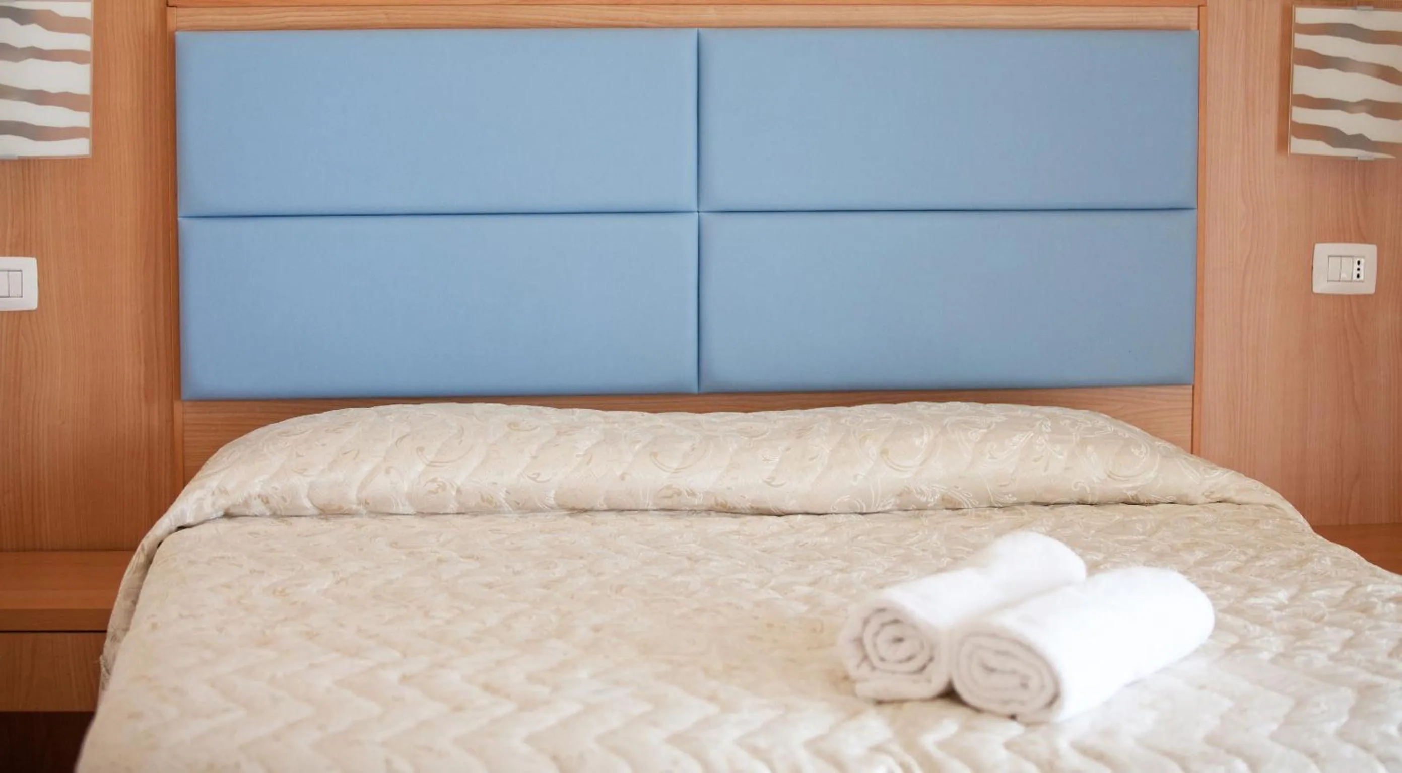 Bed in Hotel Ambassador