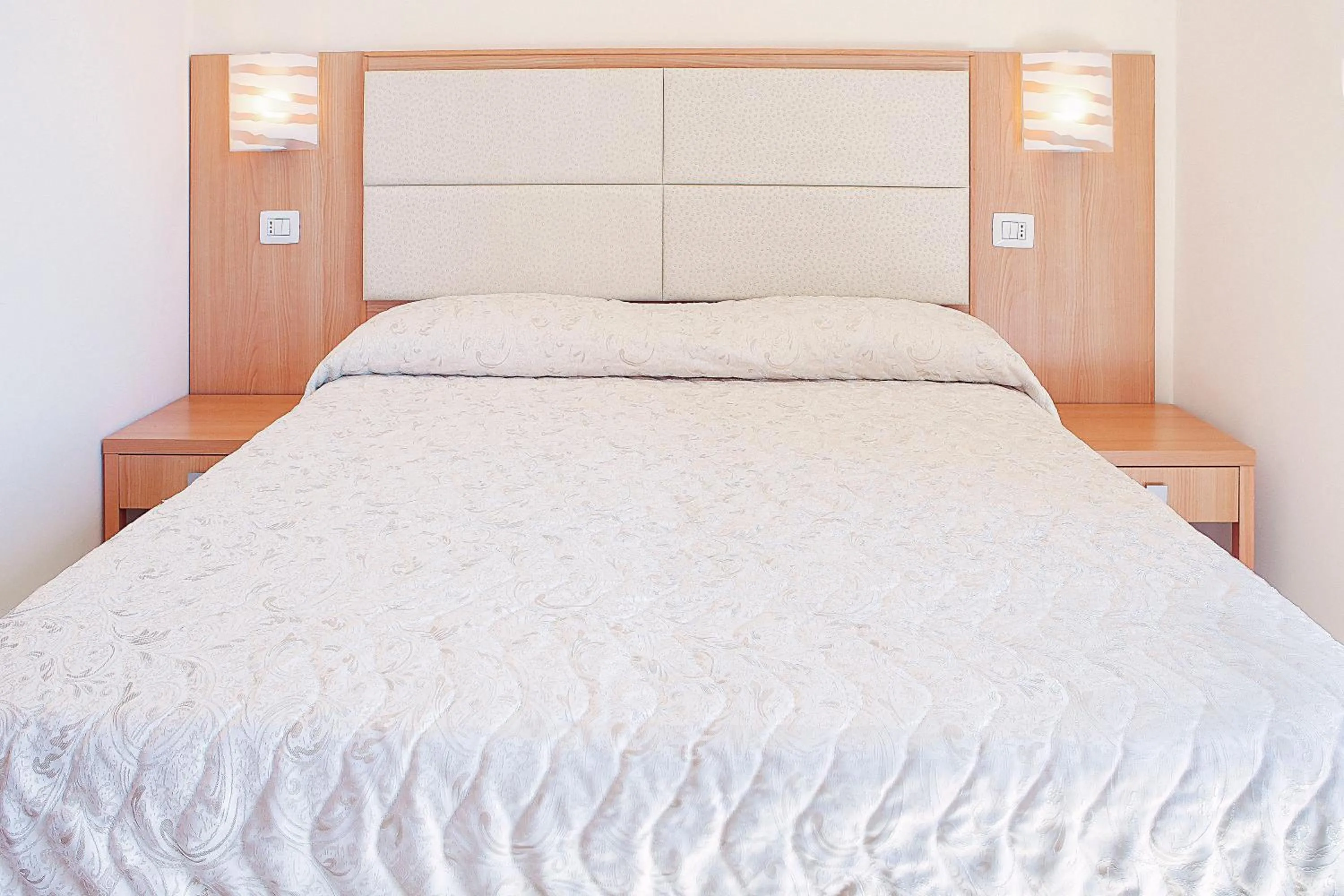 Bed in Hotel Ambassador