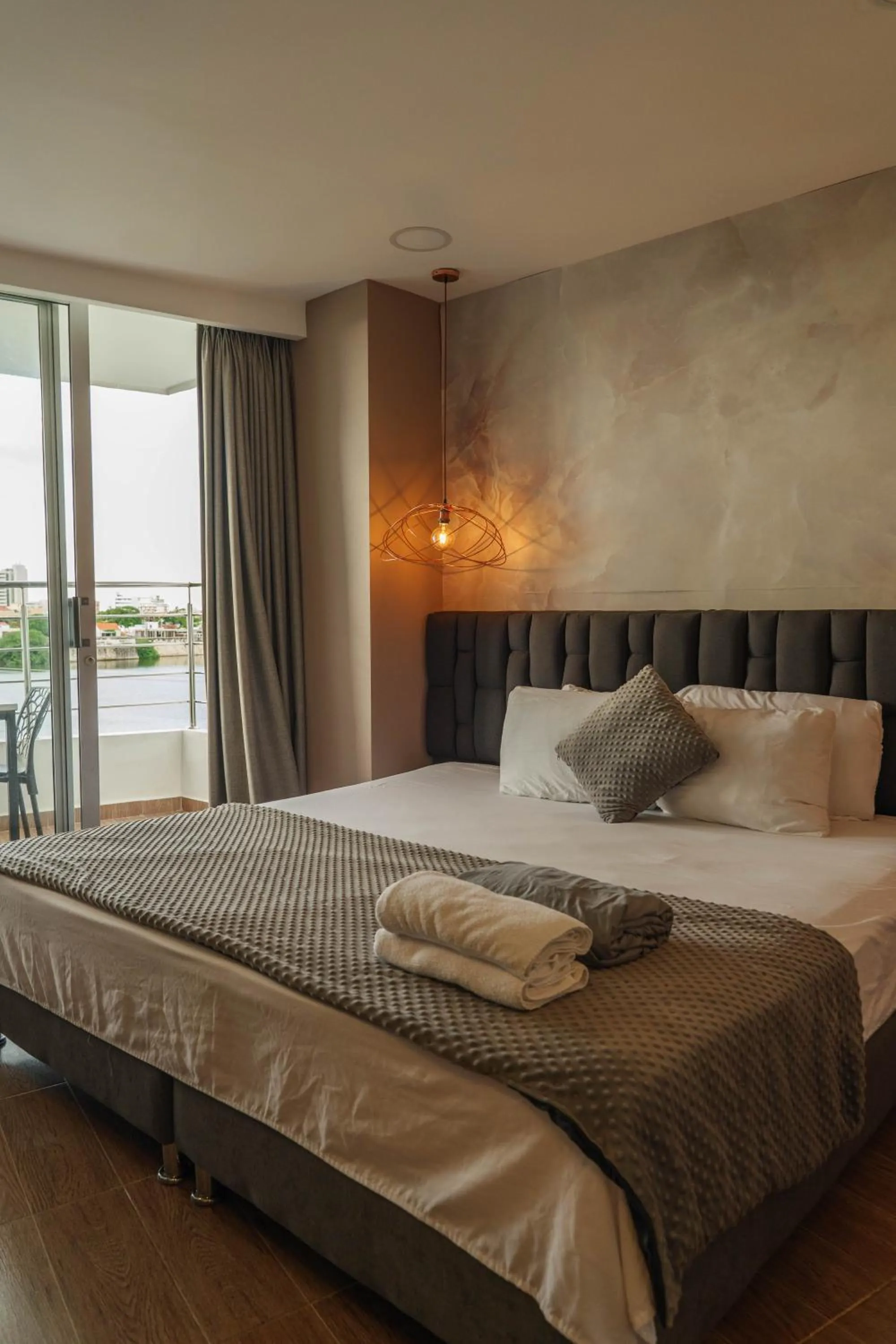 Bed in Bahia 79 Apartasuites Cerca al Centro