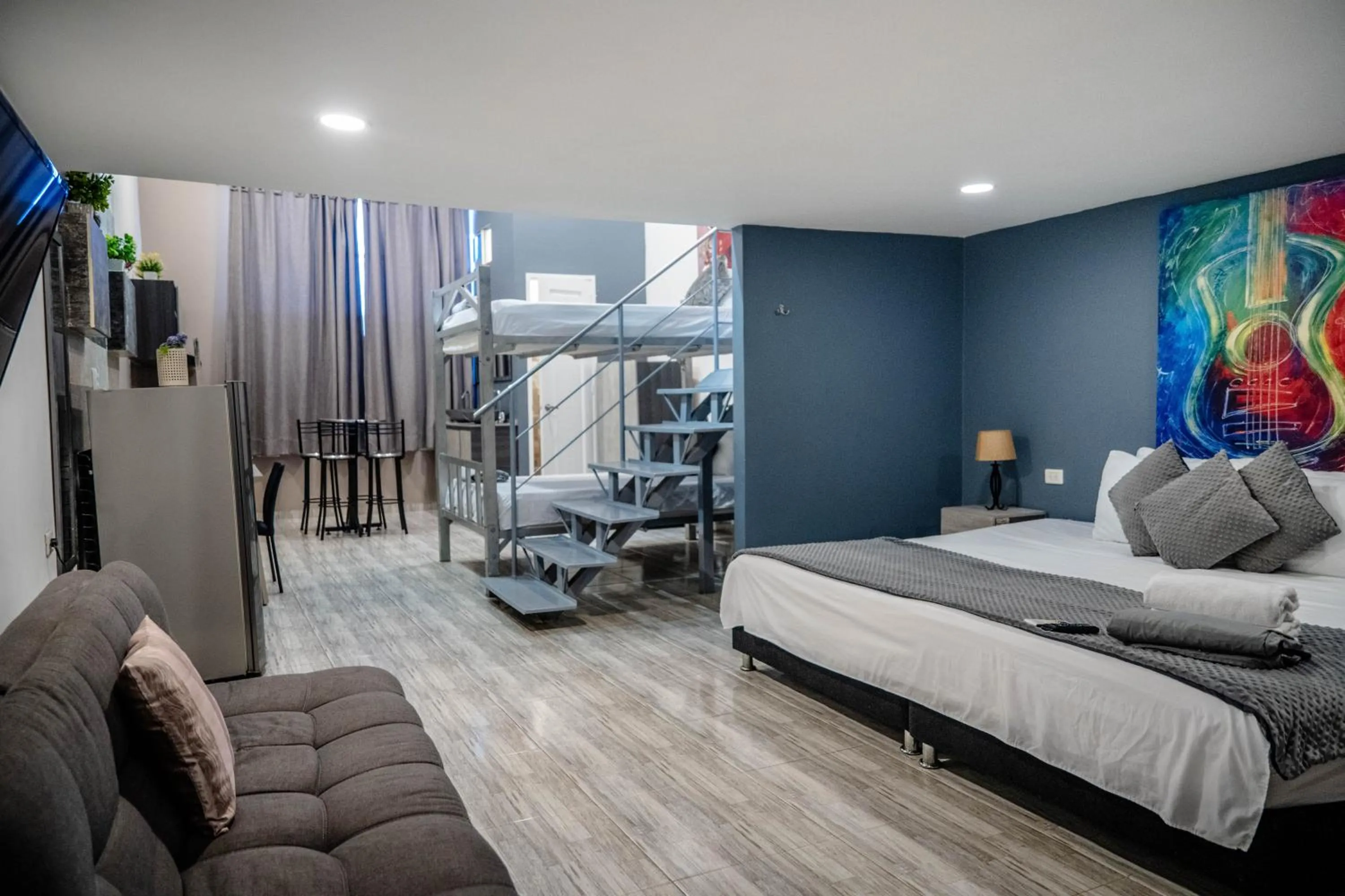 Bed in Bahia 79 Apartasuites Cerca al Centro